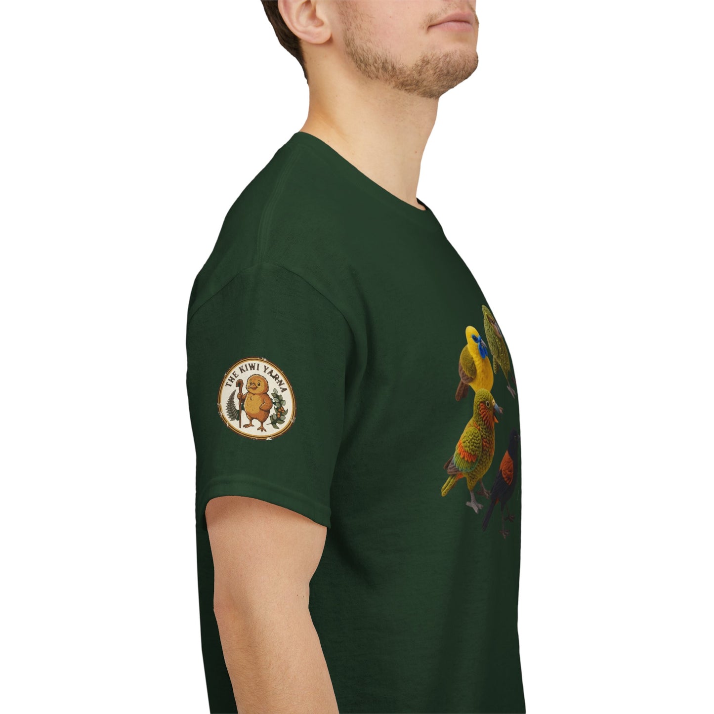 Dark green graphic T-shirt with sleeve patch and colorful birds