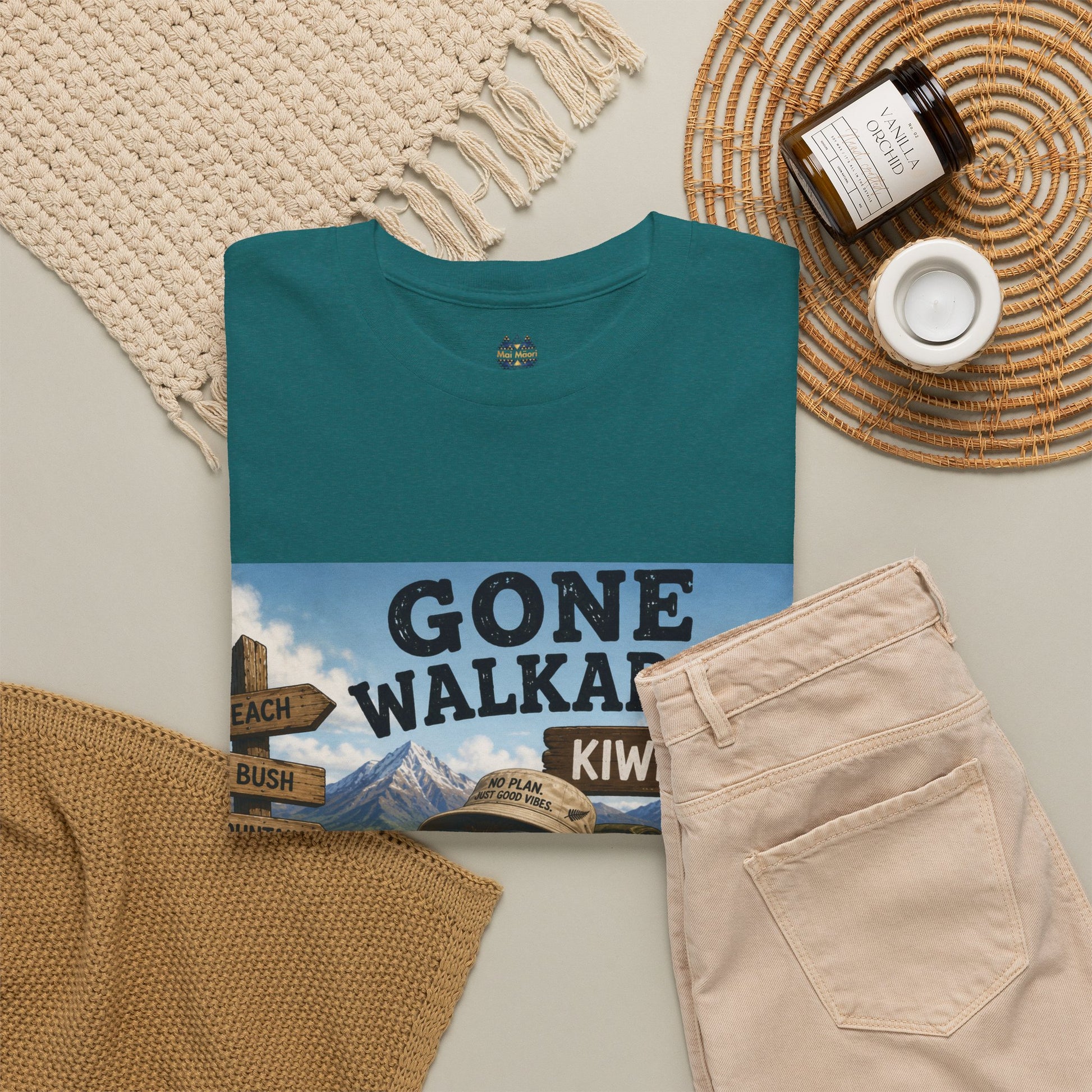 Teal crew-neck T-shirt with adventure kiwi graphic, flat-lay view