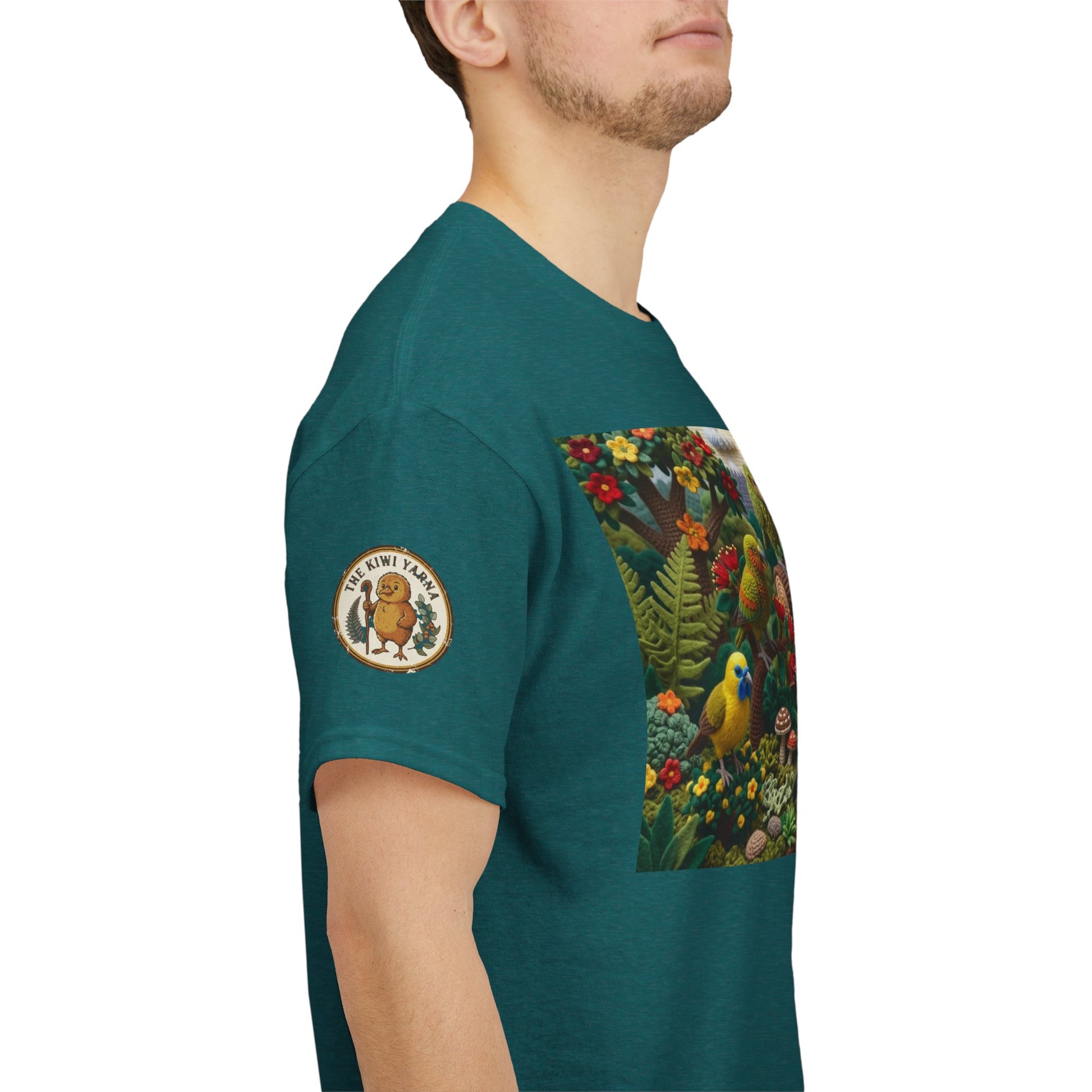 Teal crew-neck T-shirt with rectangular bird scene graphic and left chest patch