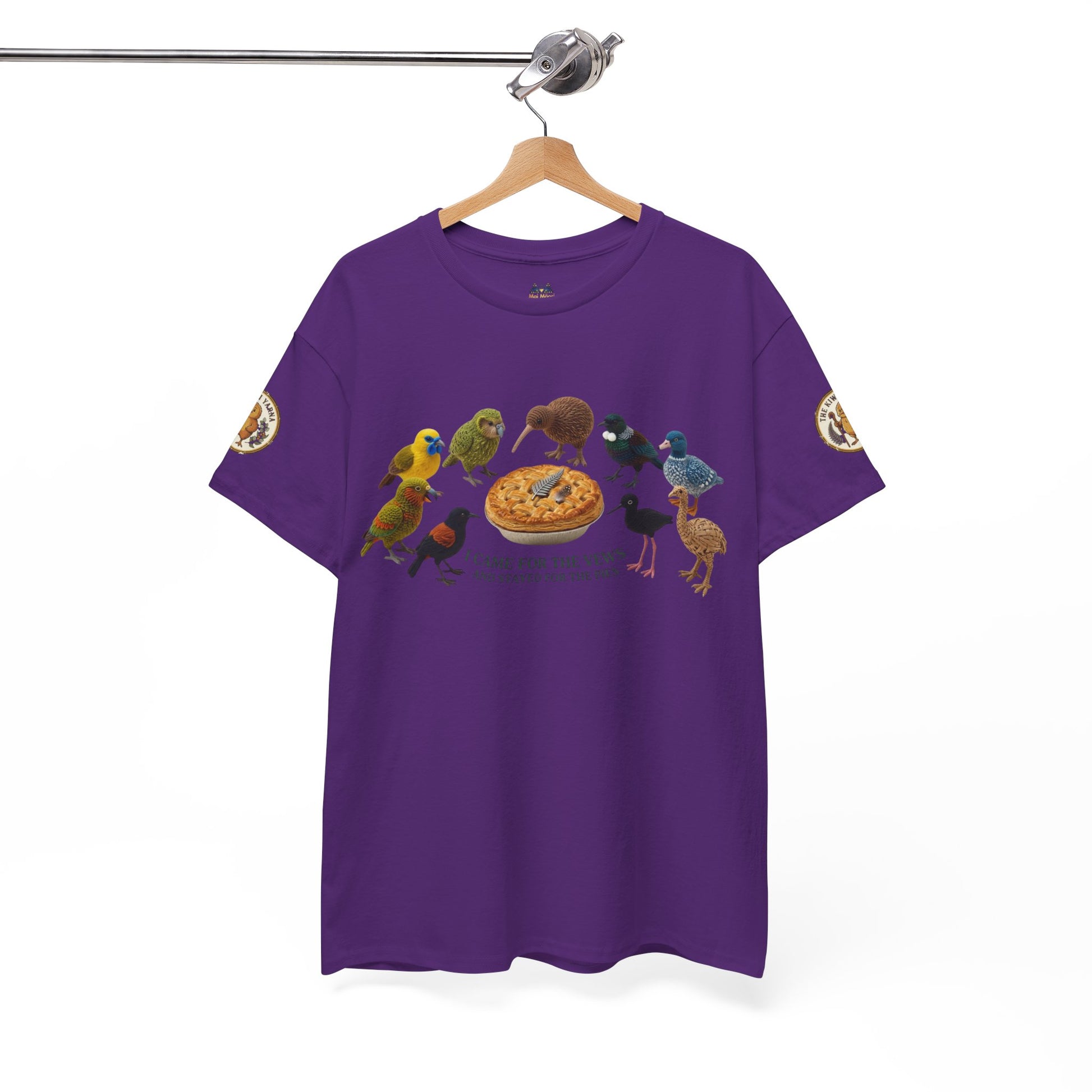 Purple graphic T-shirt on hanger with birds and pie-style emblem