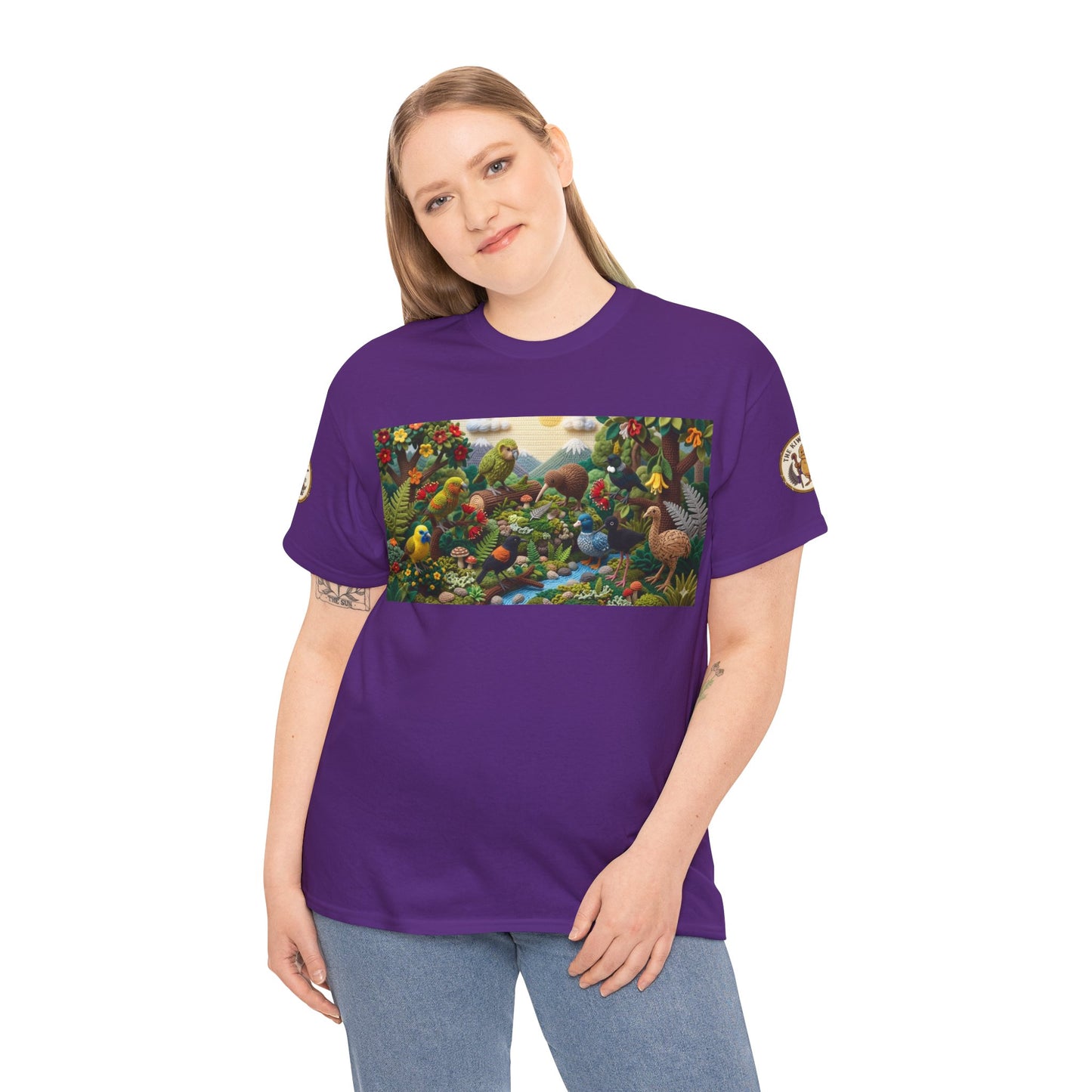 Purple short-sleeve T-shirt with scenic birds and foliage graphic across chest
