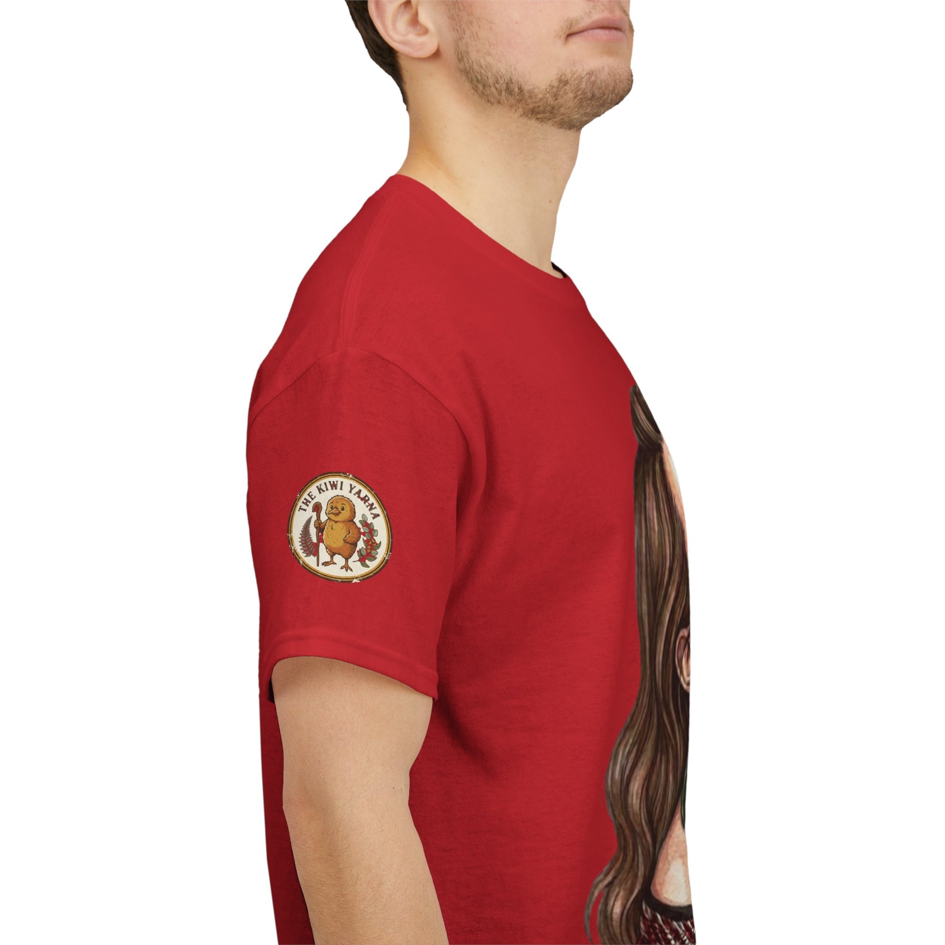 Red crewneck t-shirt with small circular sleeve logo and partial portrait graphic