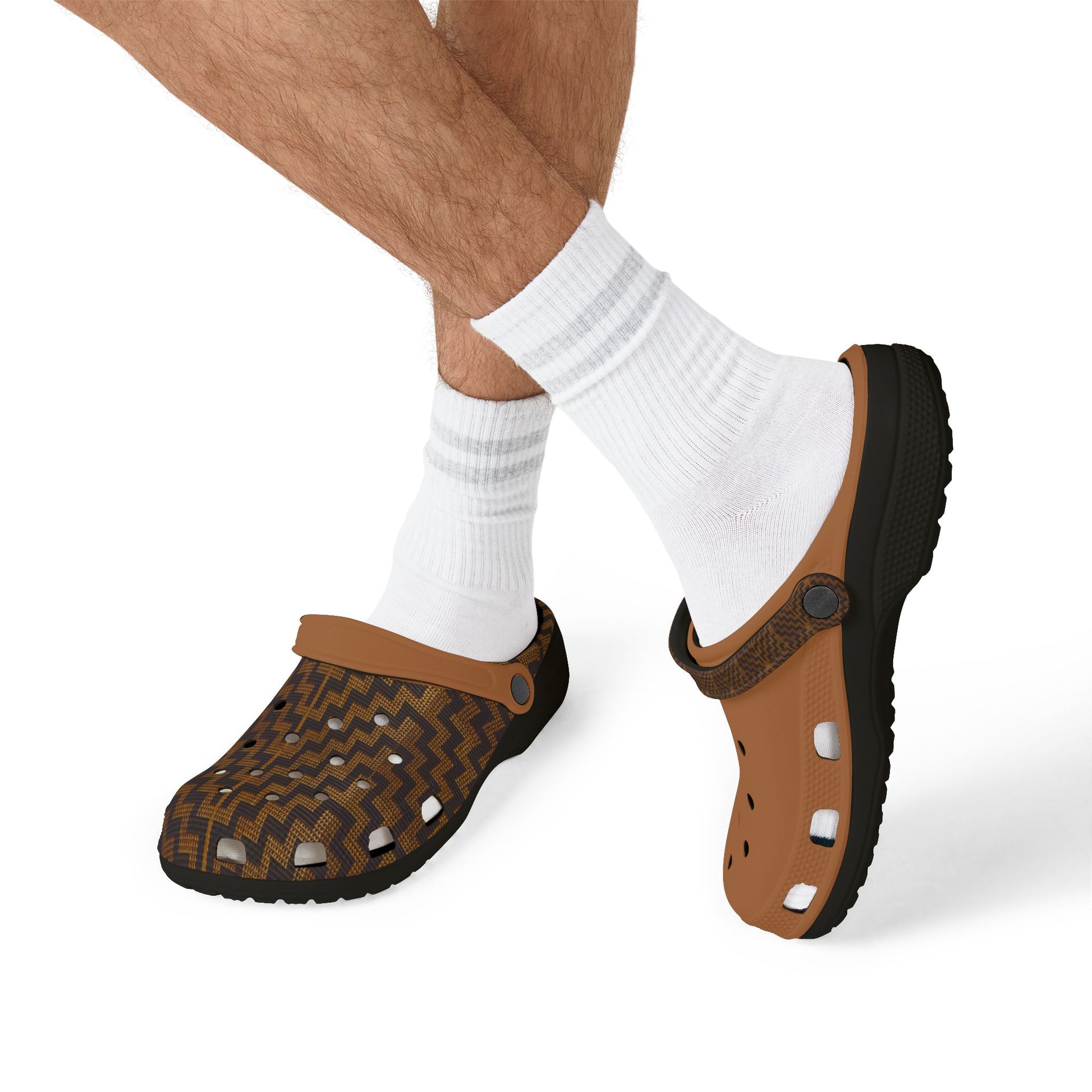 Tukutuku clog sandals on feet with white socks: brown patterned and tan styles