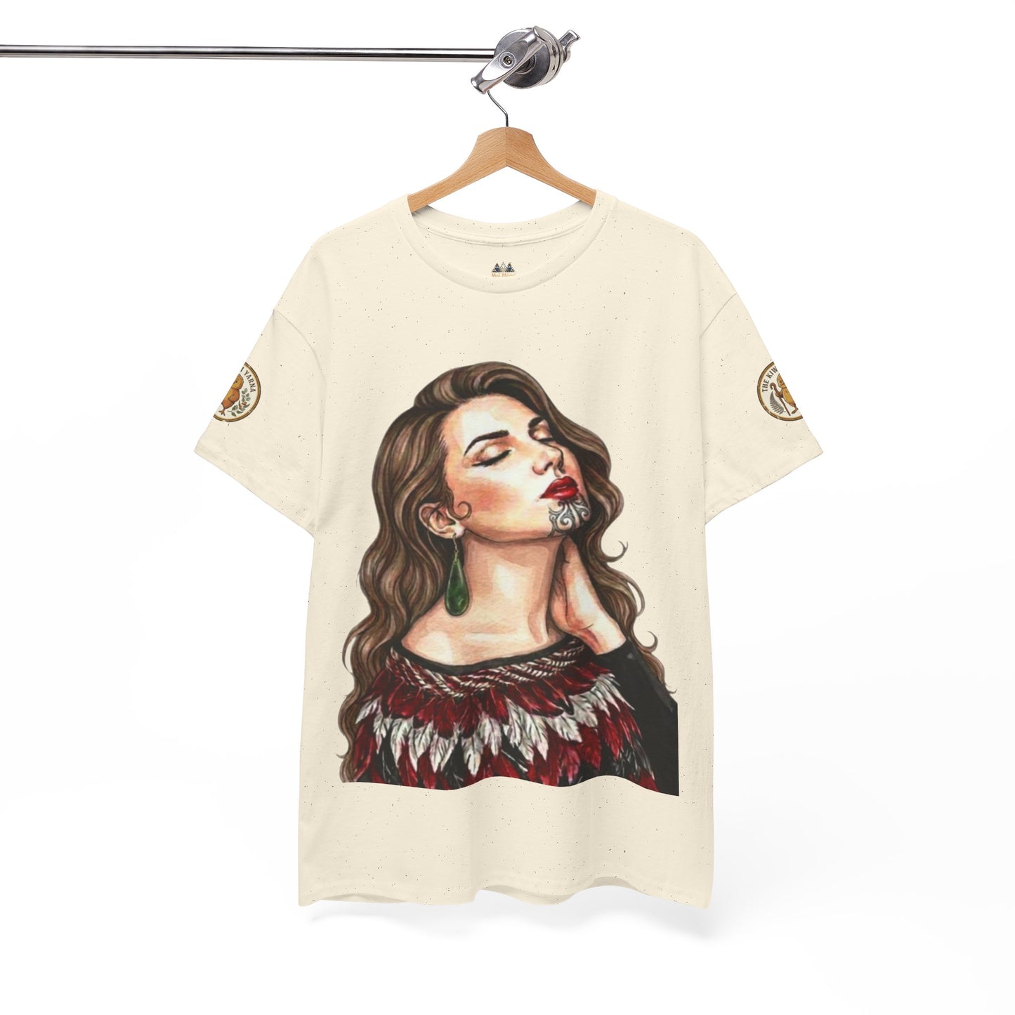 Cream T-shirt with portrait graphic on front and decorative sleeve patches