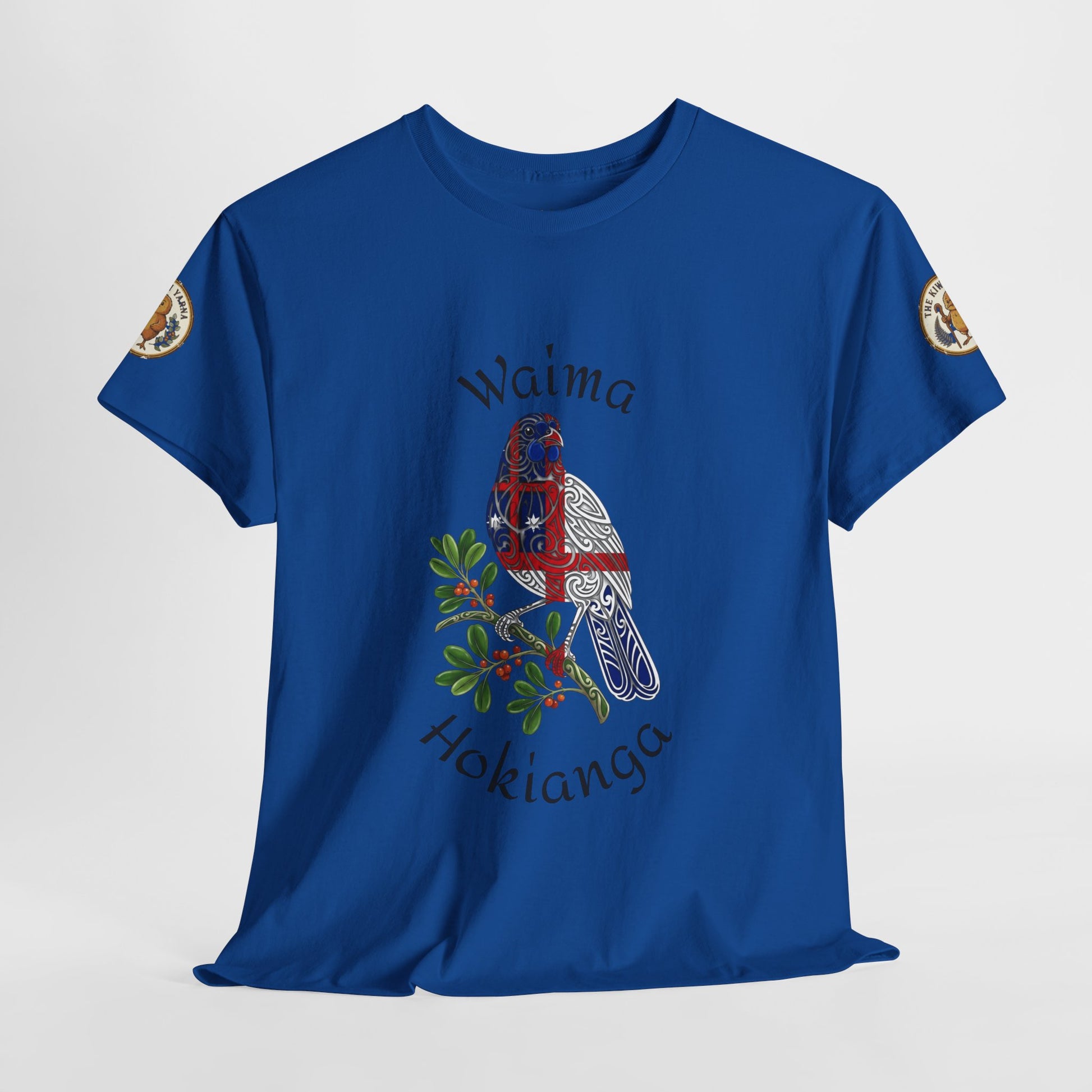 Blue T-shirt with Waima Hokianga bird graphic and sleeve emblem patches