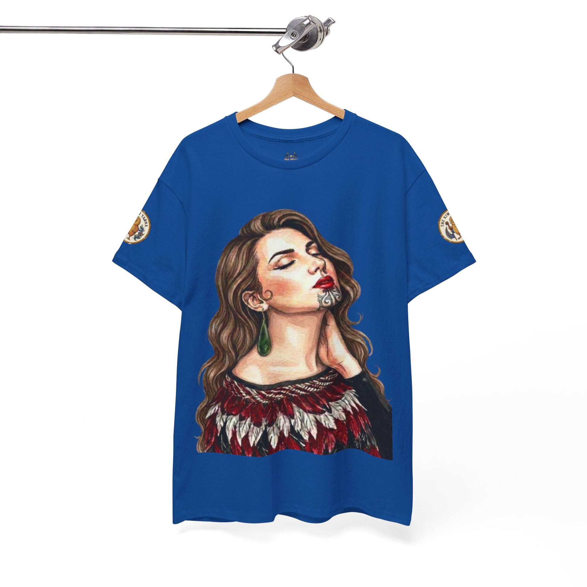 Royal blue graphic T-shirt on hanger with portrait print and round sleeve logo patches.