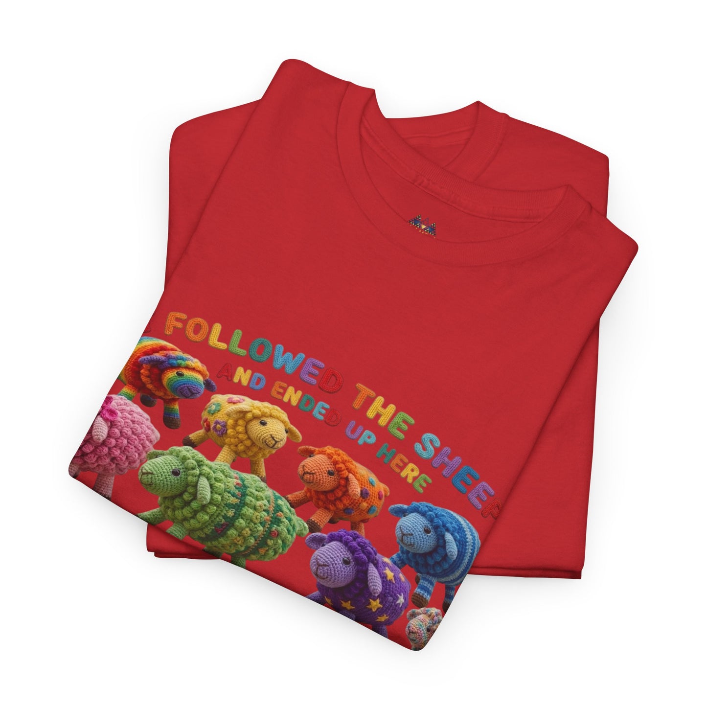 Red T-shirt with 'FOLLOW THE SHEEP' graphic and colorful animal herd print