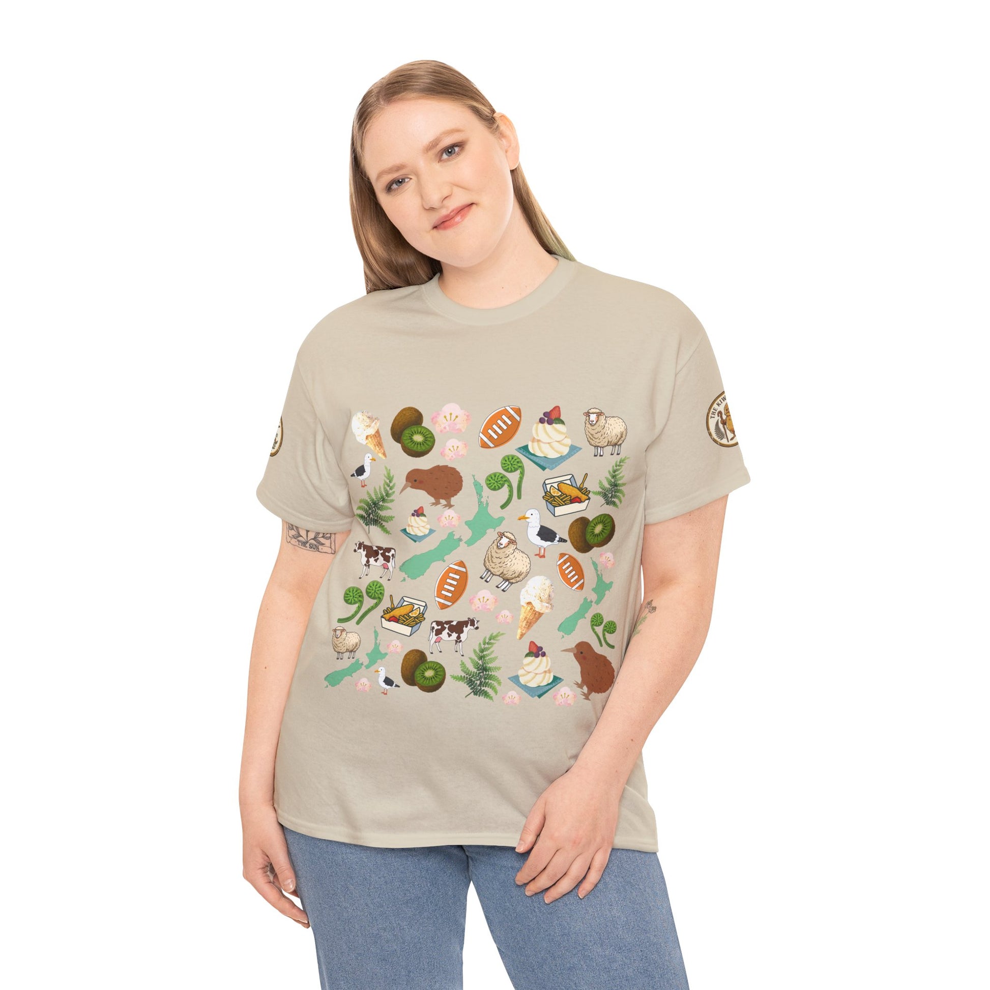 Beige crewneck T-shirt on model with colorful Kiwiana collage graphic
