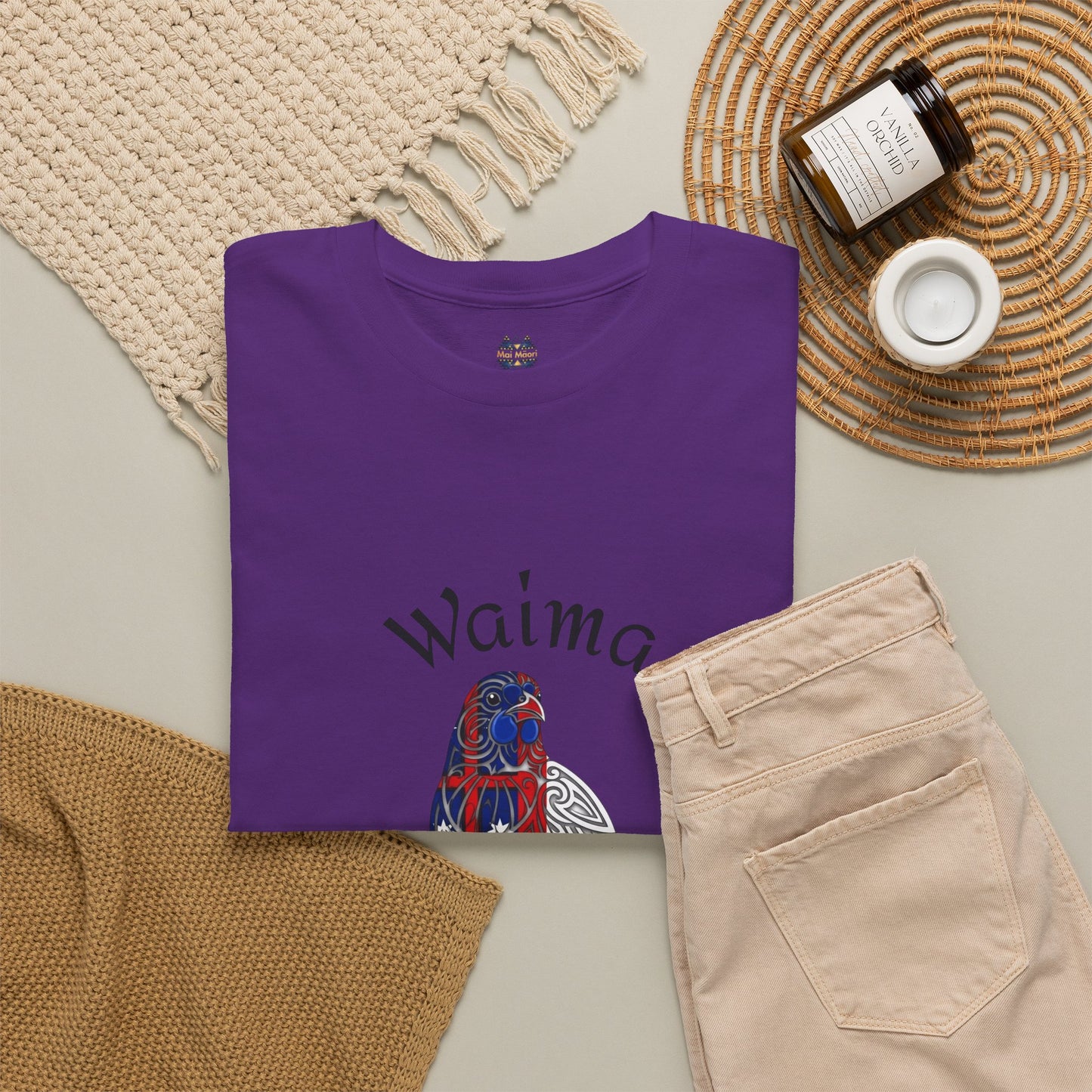 Purple graphic T-shirt with Waima and bird print