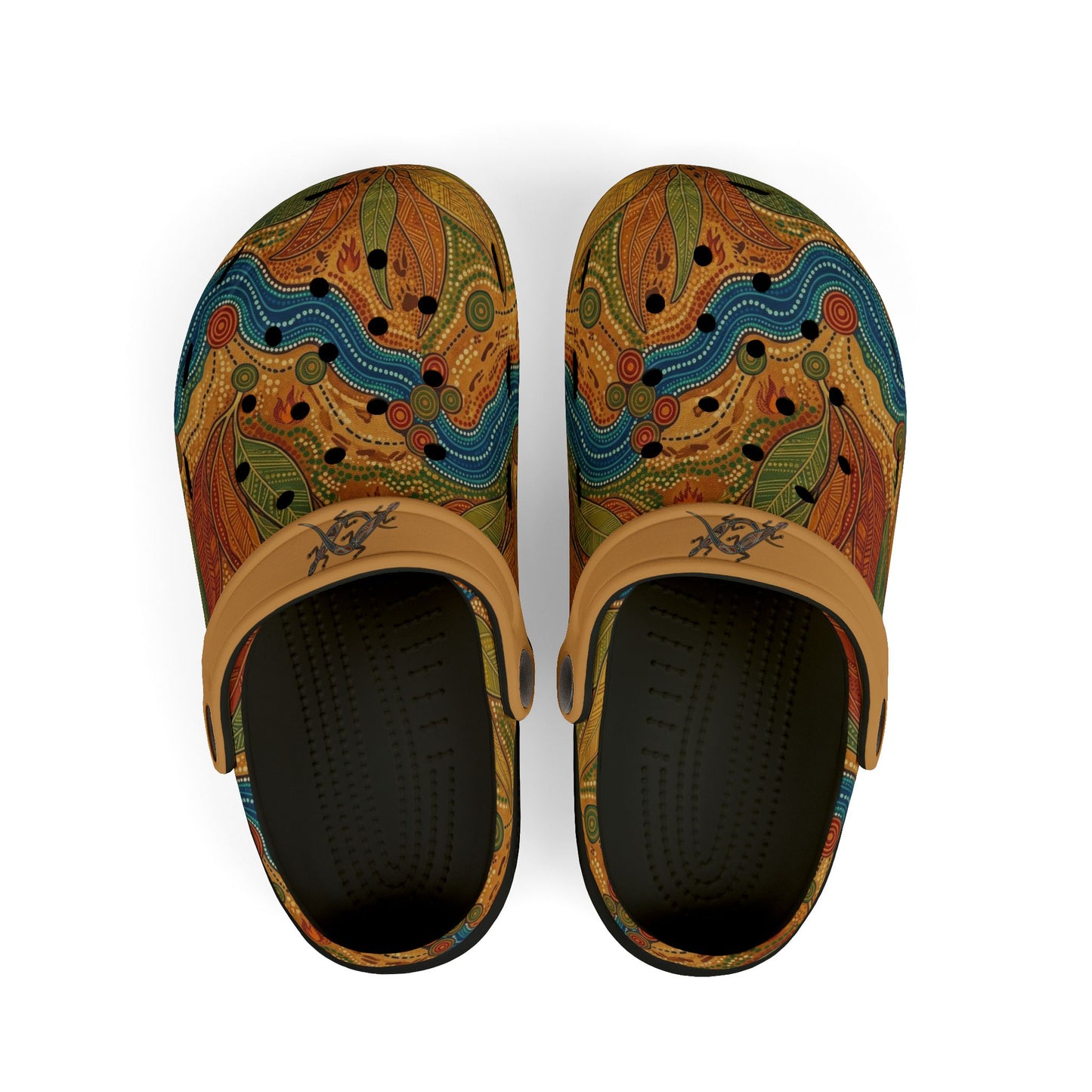 Pair of casual slip-on clogs with tan strap, colorful Aboriginal art uppers.