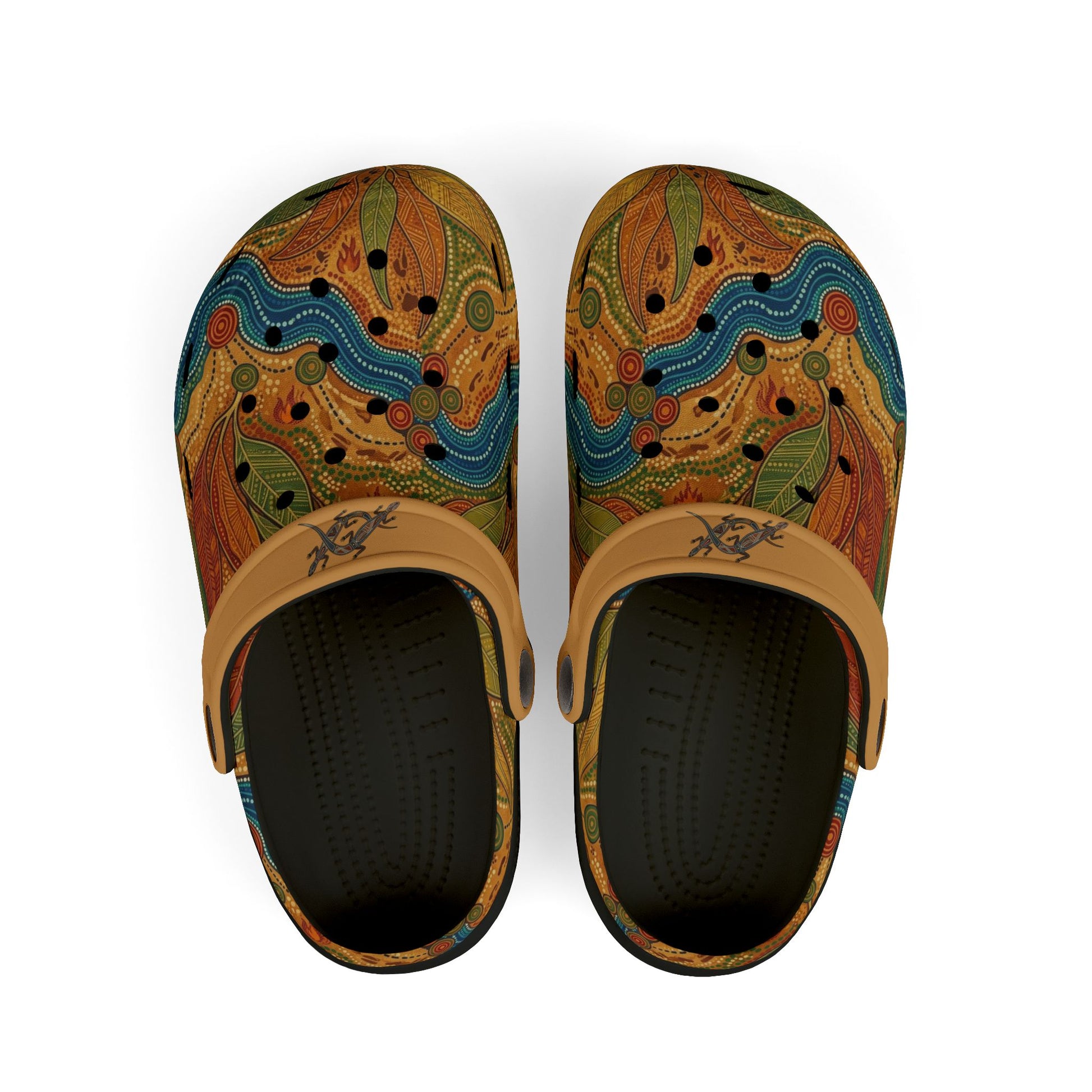 Pair of casual slip-on clogs with tan strap, colorful Aboriginal art uppers.
