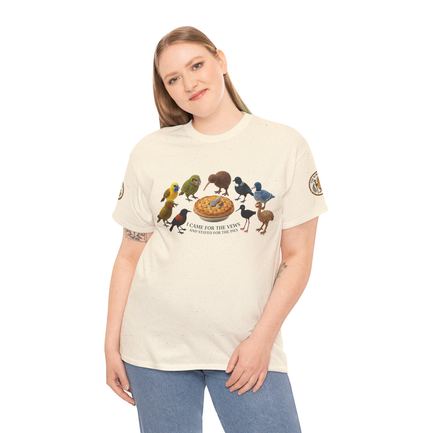 Cream graphic T-shirt worn by model with birds and pizza front print