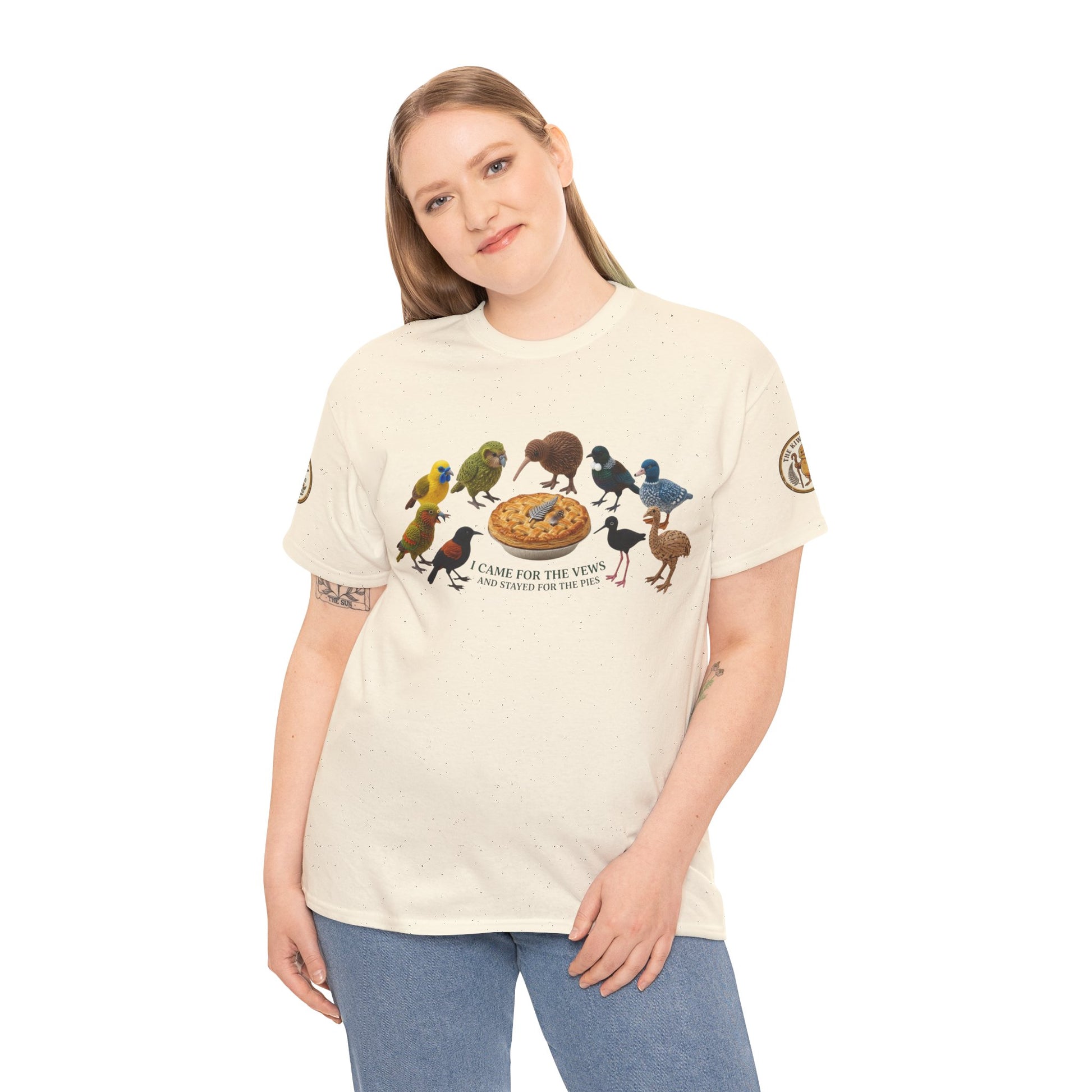 Cream graphic T-shirt worn by model with birds and pizza front print