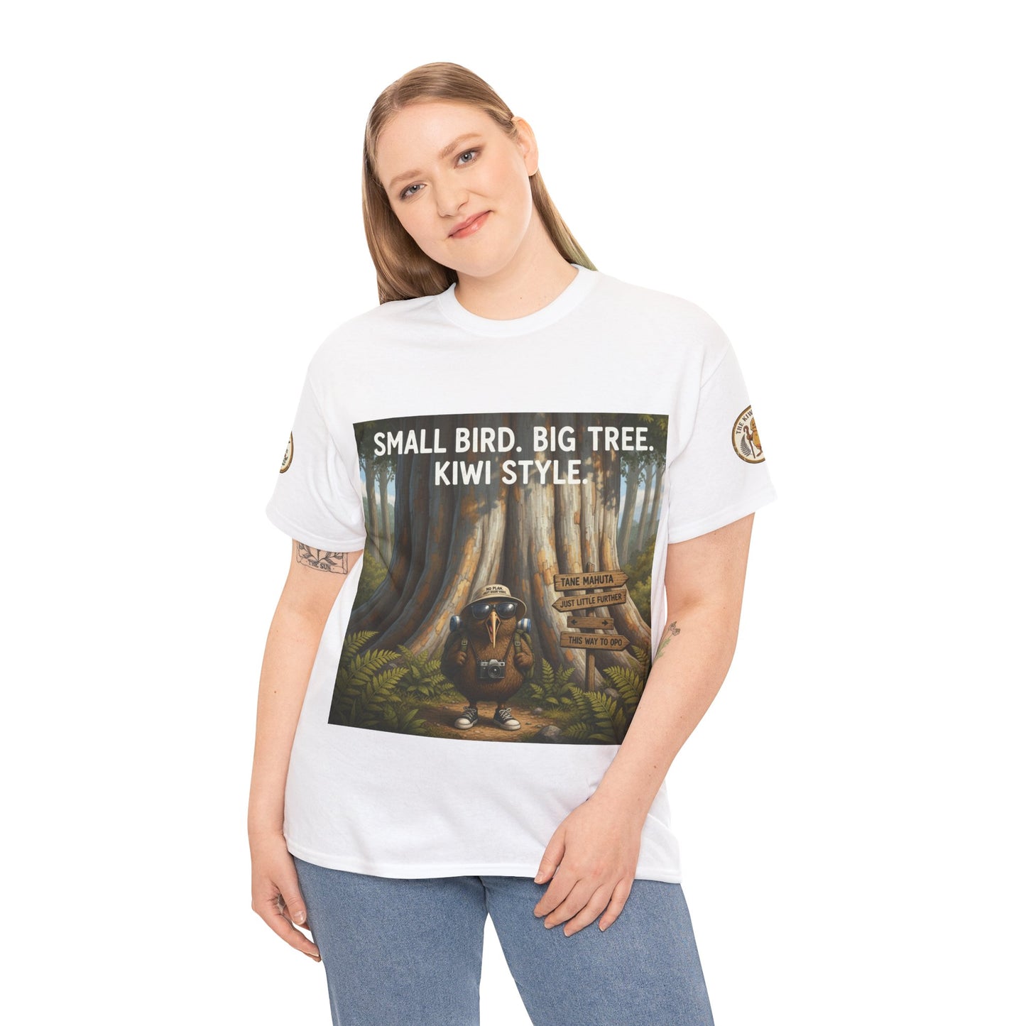 White T-shirt on model with centered forest graphic and “KIWI STYLE” text print
