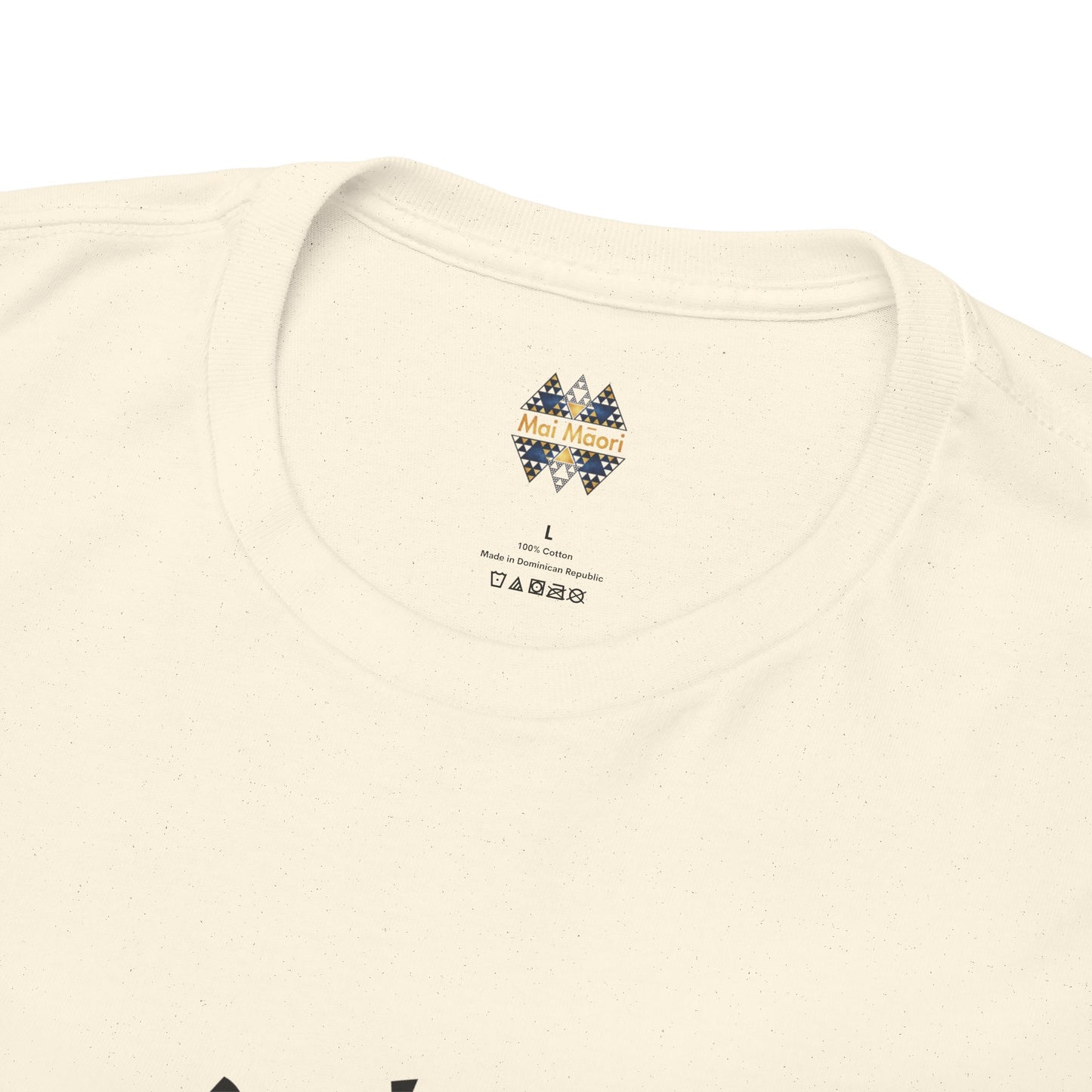 Cream T-shirt neckline close-up with small multicolor label logo