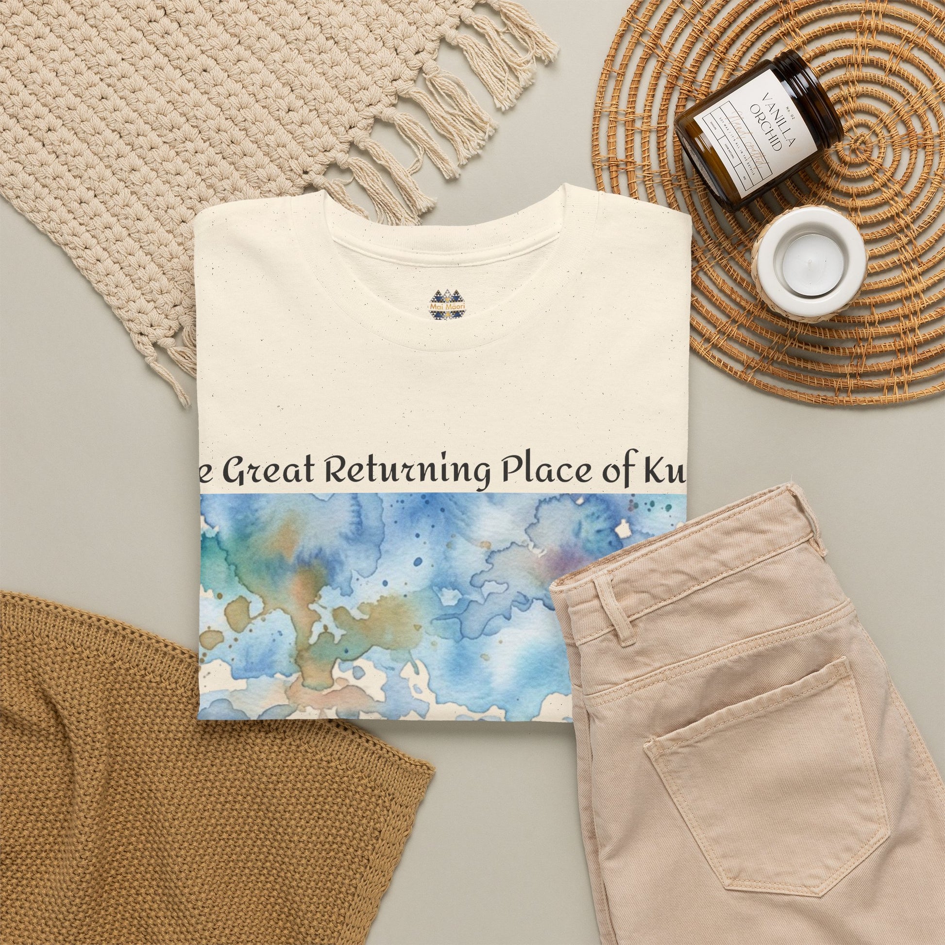 Cream T-shirt with partial front landscape print and small chest emblem