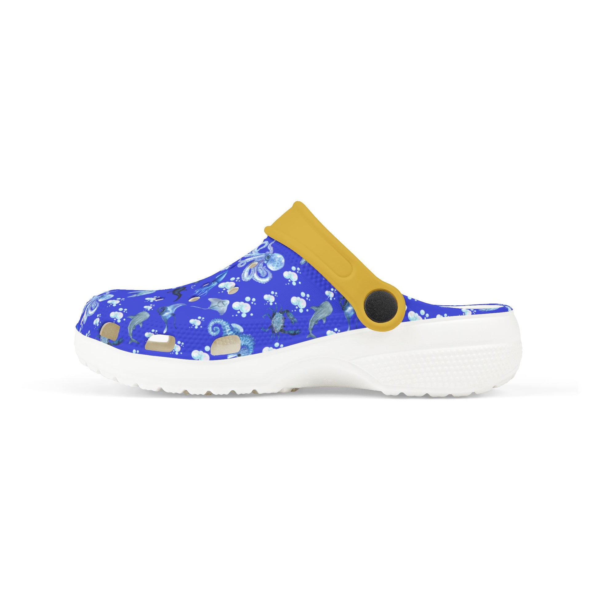 Kids' sea-print clog shoes with blue top, yellow strap, white base sole, side profile.