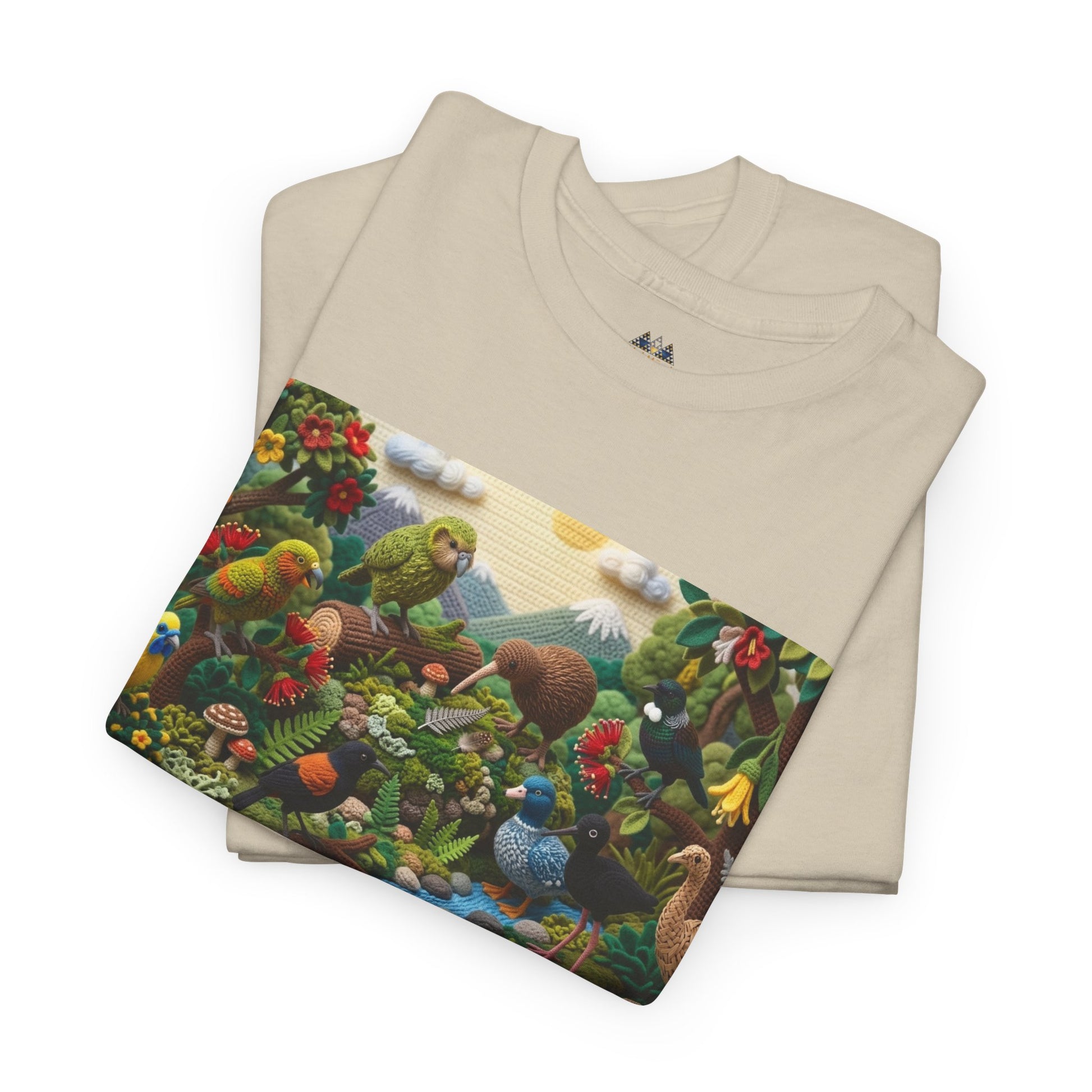 Folded sand crew-neck T-shirt with birds-and-forest rectangular front graphic panel.