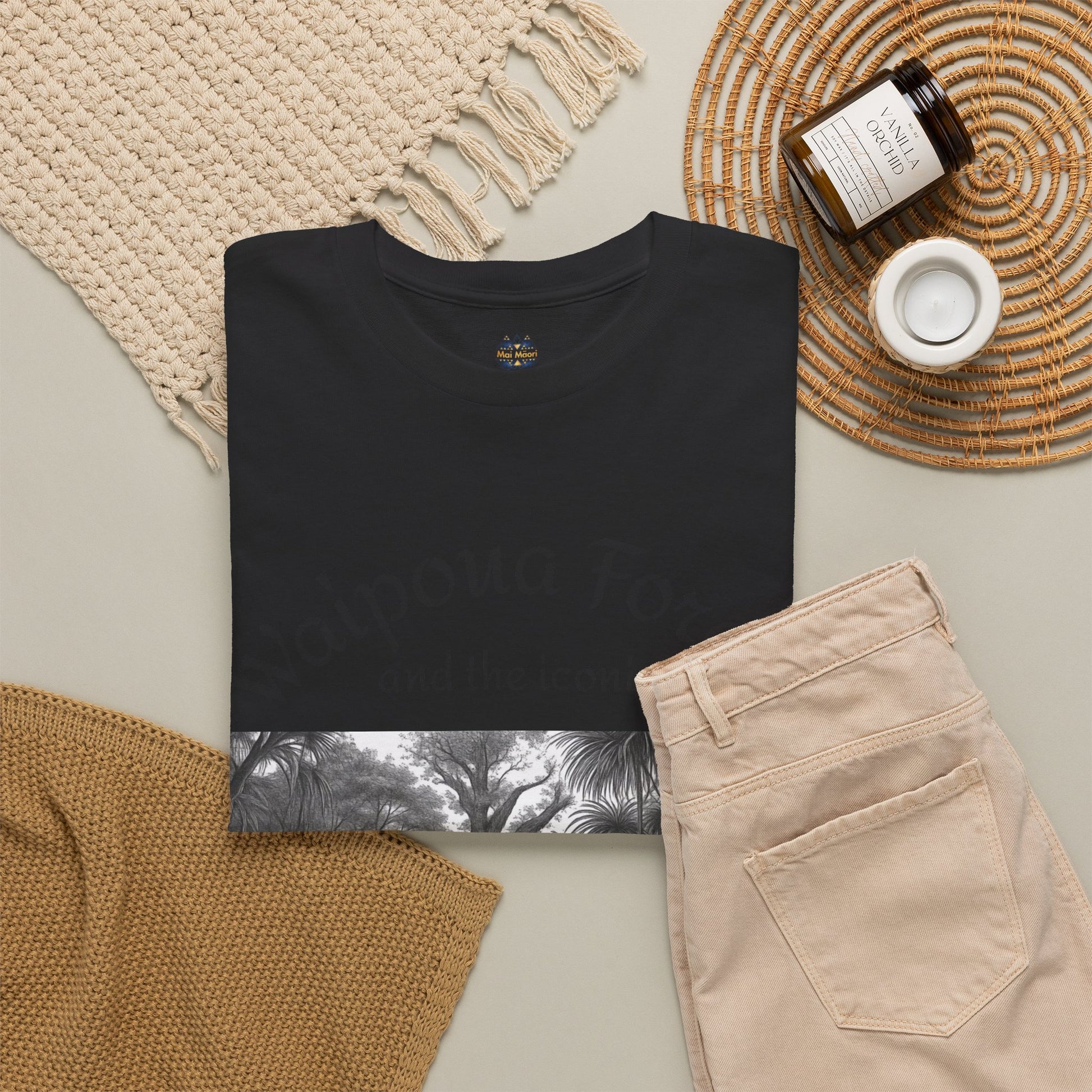 Black T-shirt with small chest logo and horizontal grayscale forest graphic