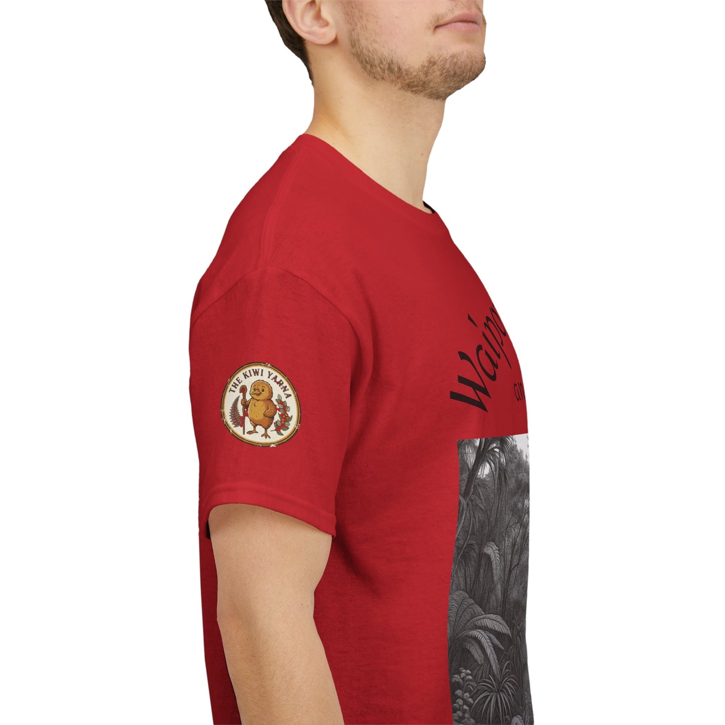 Red T-shirt sleeve with circular logo patch and black-and-white forest side graphic
