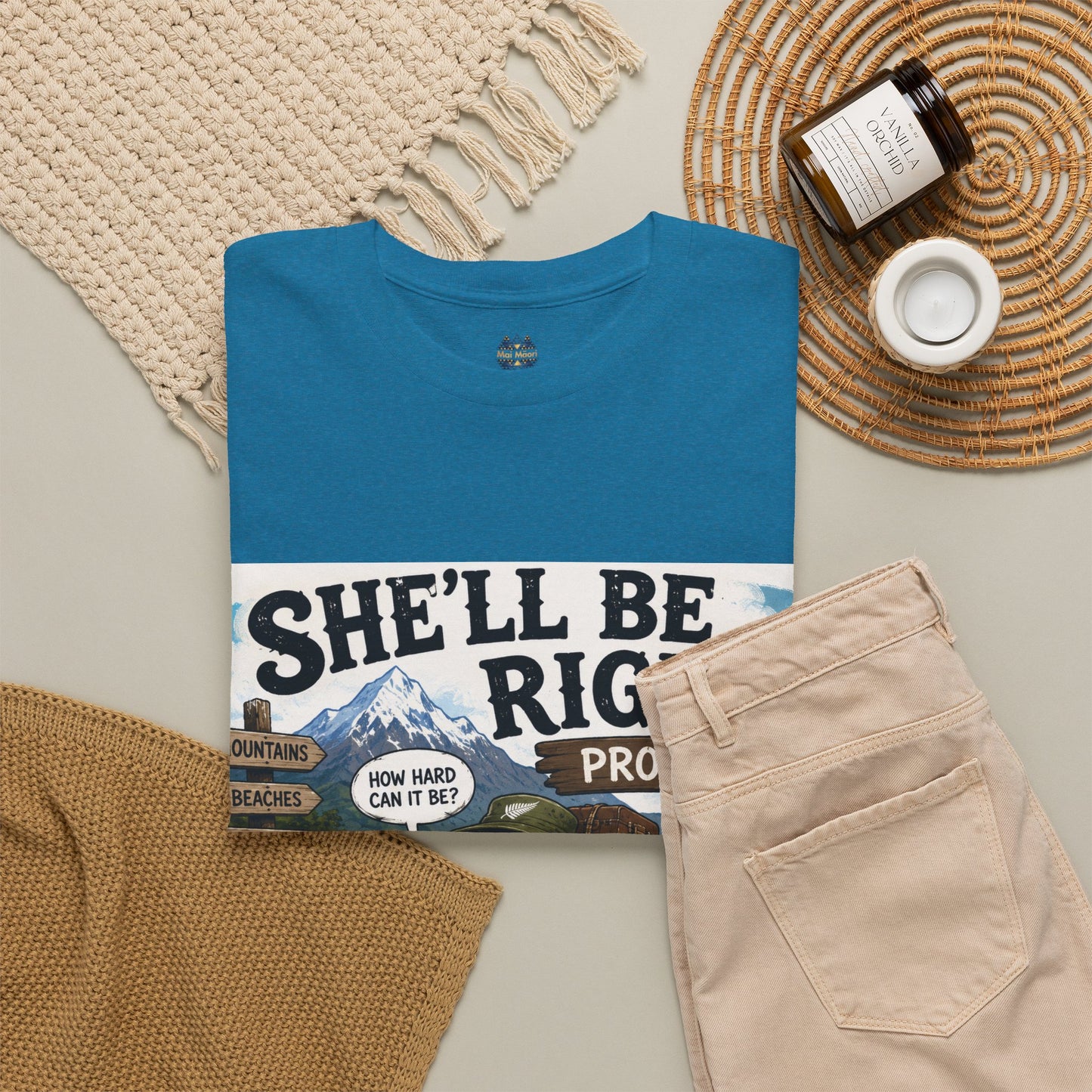 Teal graphic T-shirt with front 'She'll Be Right... Probably' panel