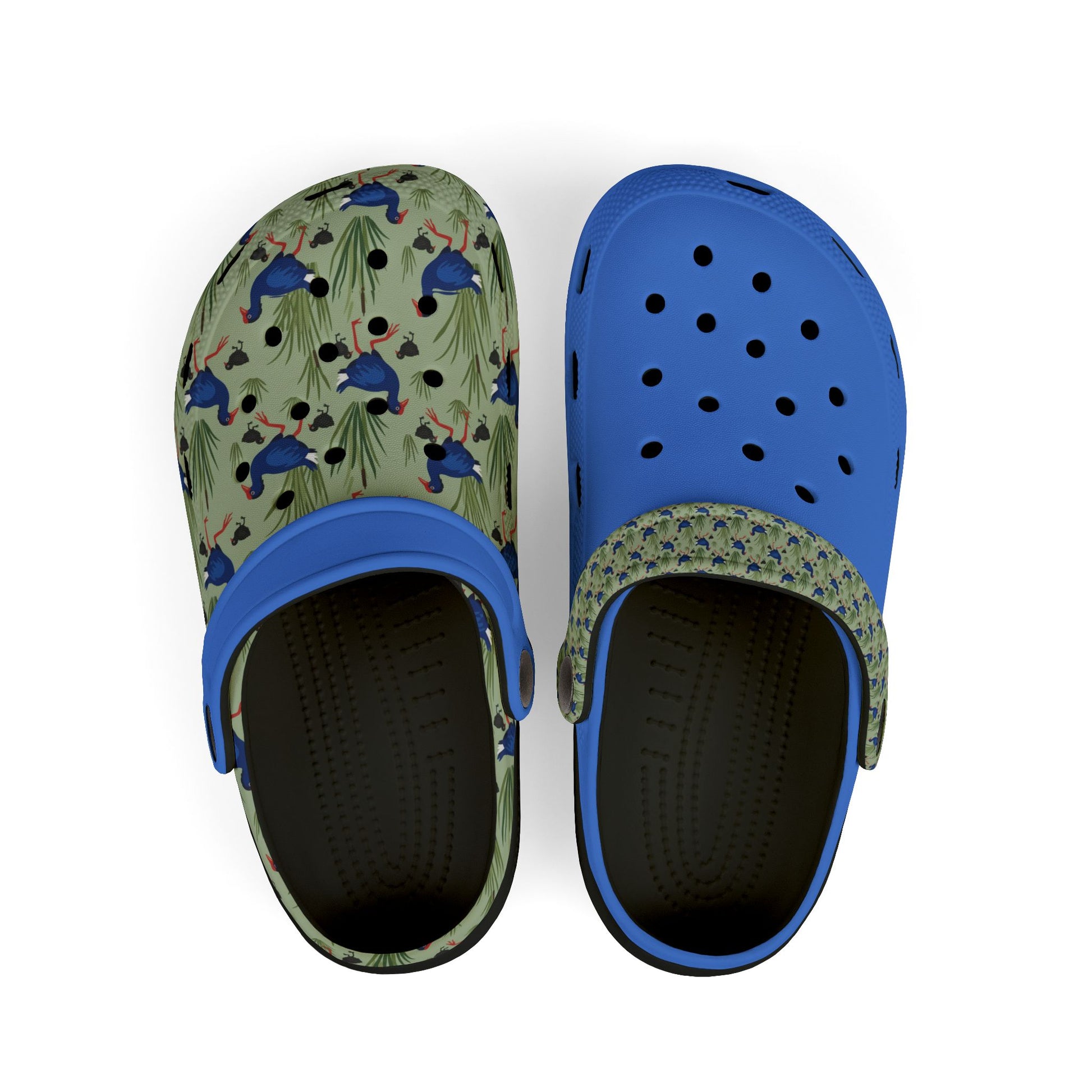 Kids slip-on clog shoes with green animal print and blue perforated top, white sole.