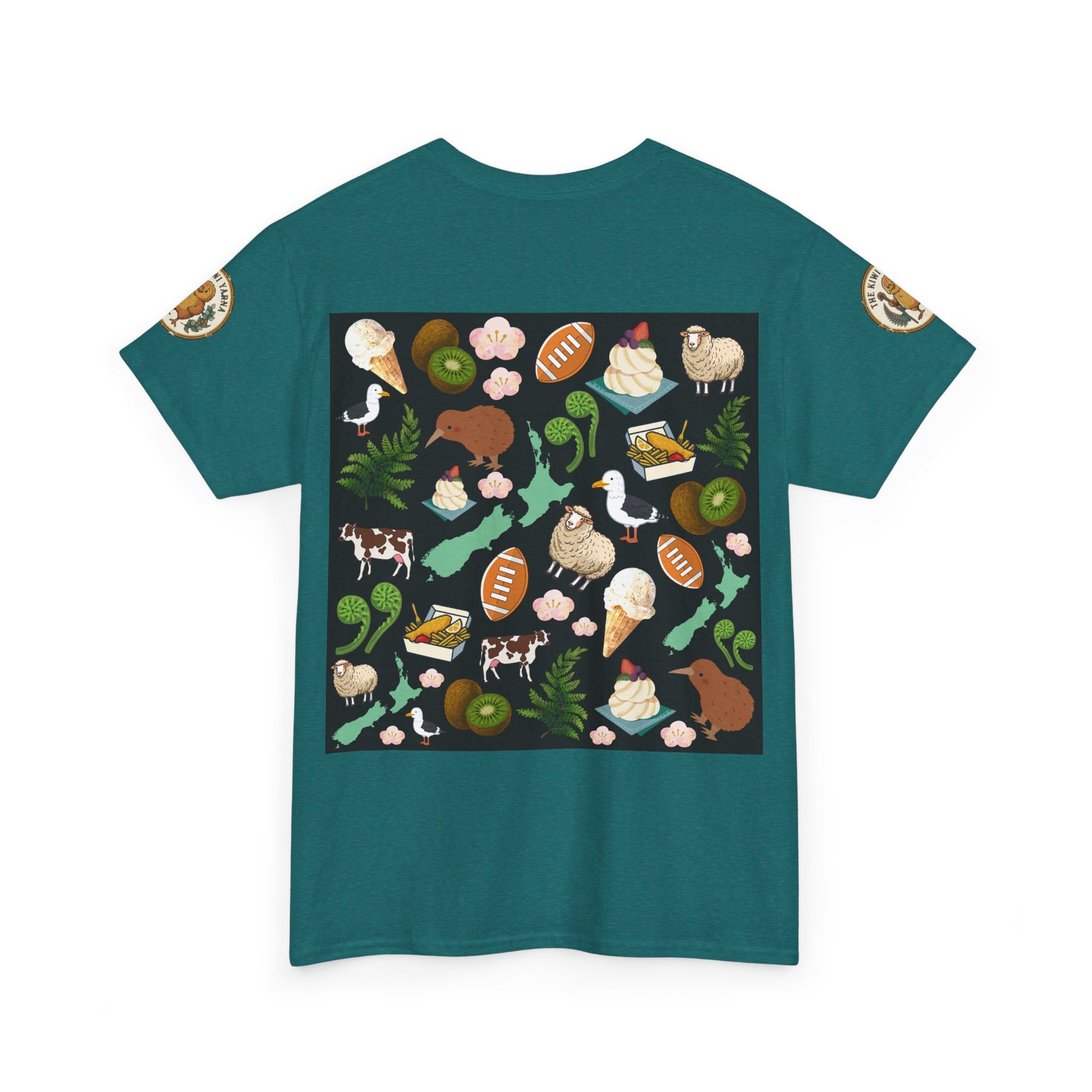 Teal crewneck T-shirt with large square Kiwiana-themed collage graphic (front)