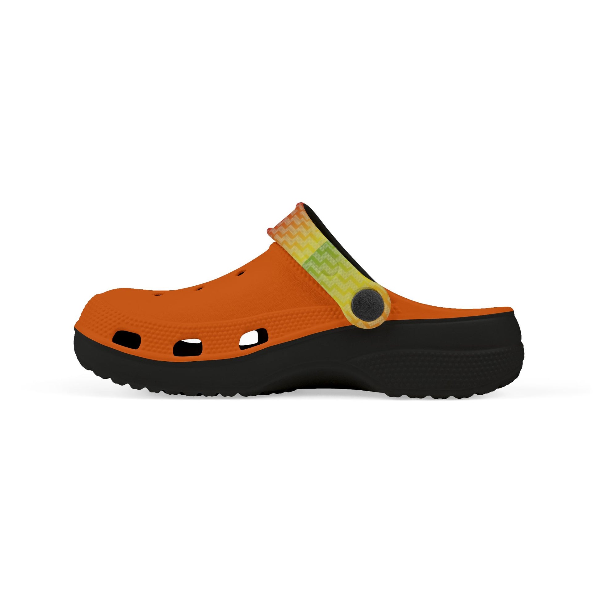 Orange clogs with lime patterned panel, black platform sole, and round strap on top.