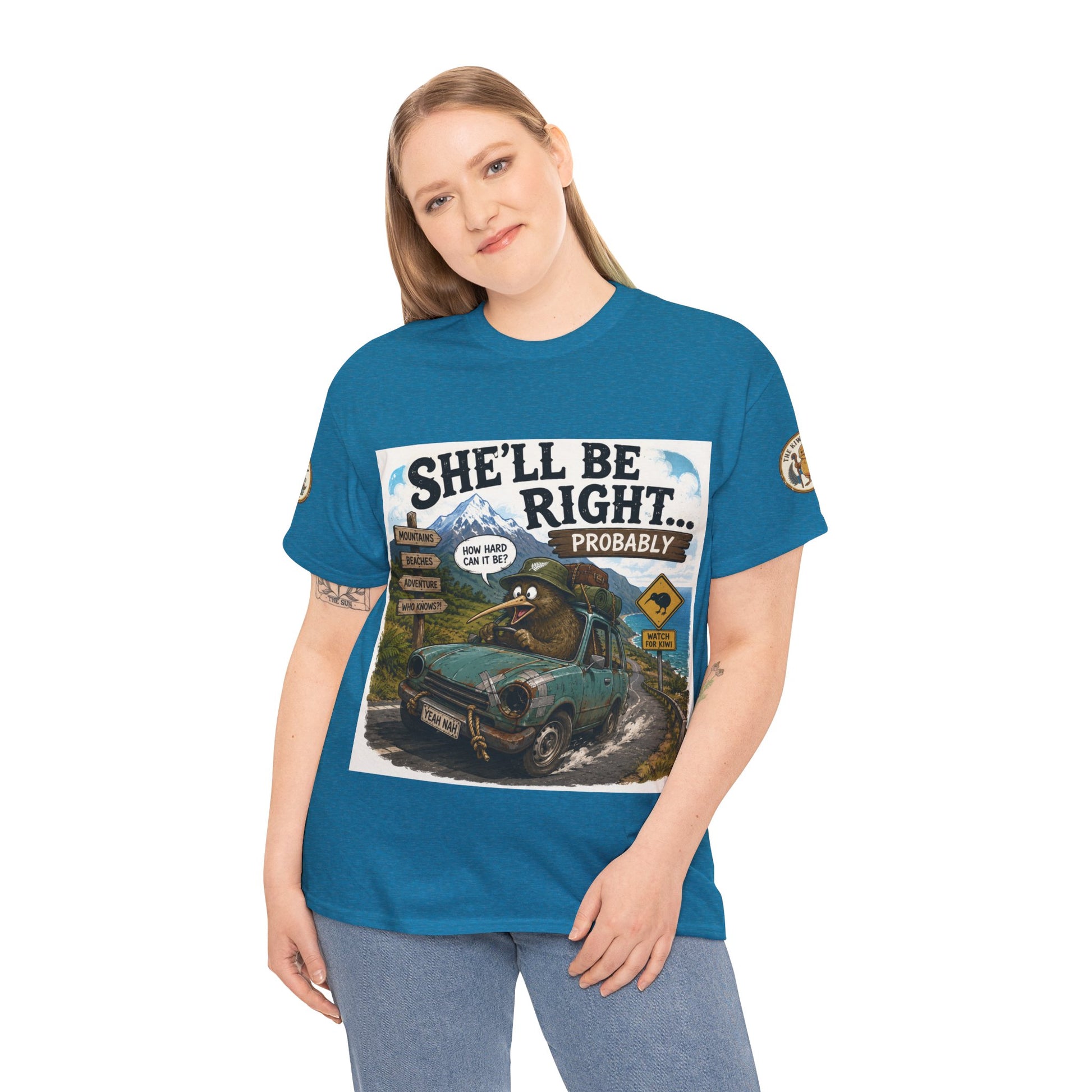 Teal graphic T-shirt worn by model with 'She'll Be Right... Probably' vehicle print
