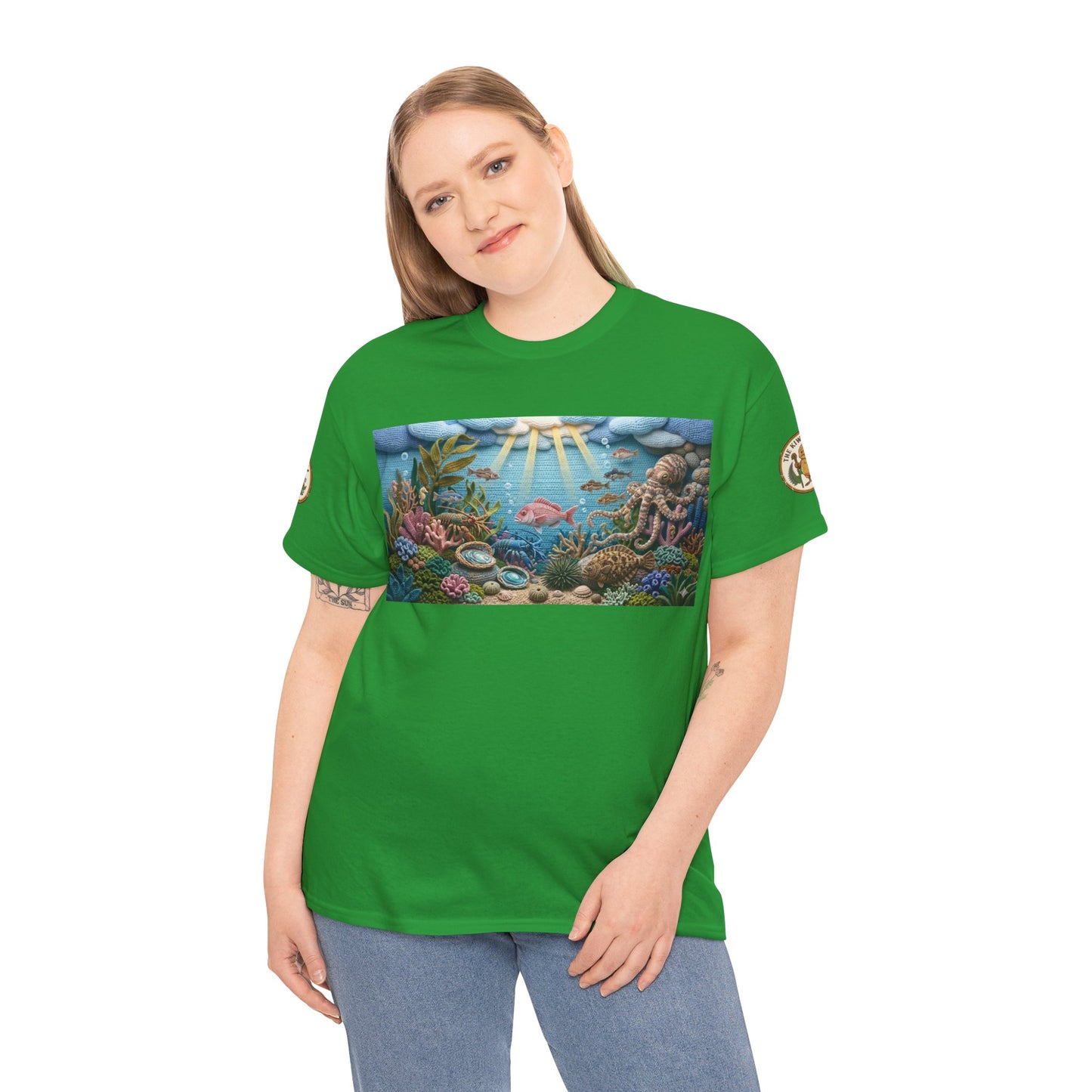 Green short-sleeve T-shirt worn by a model, featuring an undersea chest graphic