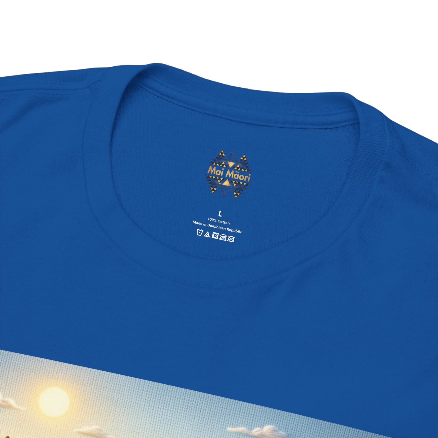 Royal blue T-shirt close-up: small chest logo and partial farm graphic.