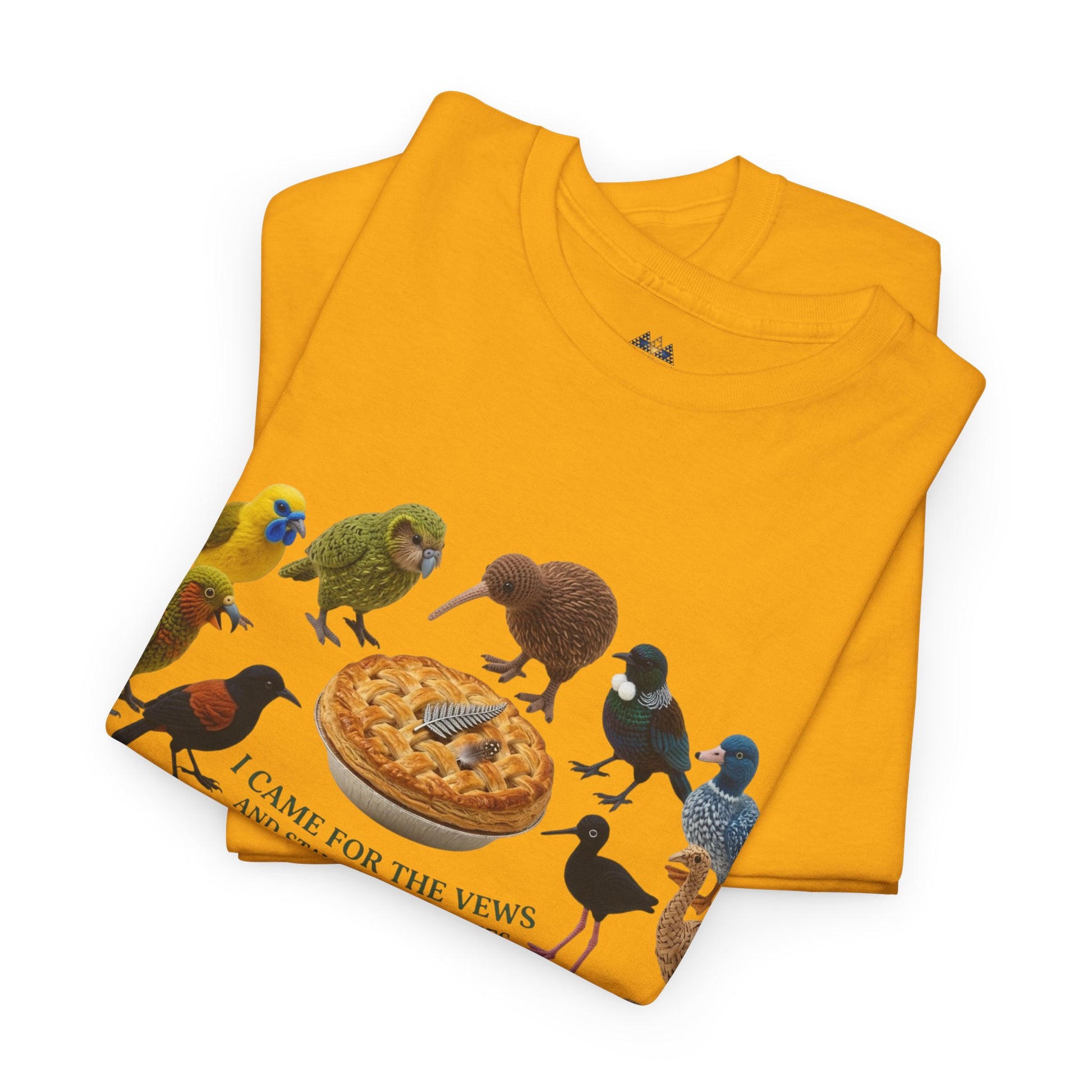 Folded yellow T-shirt showing birds and pizza graphic with brand tag at neck