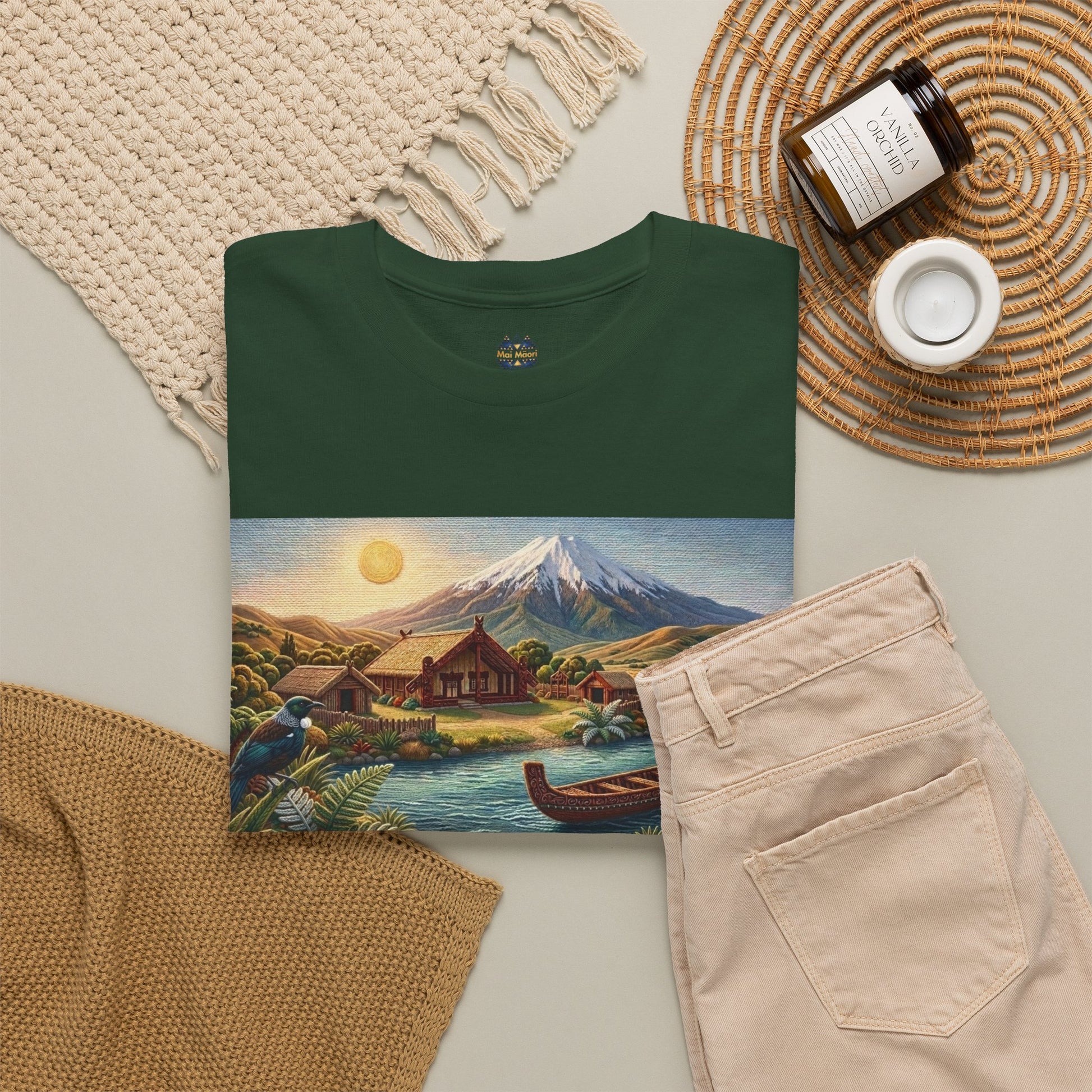 Dark green T-shirt with large front landscape graphic and small chest logo