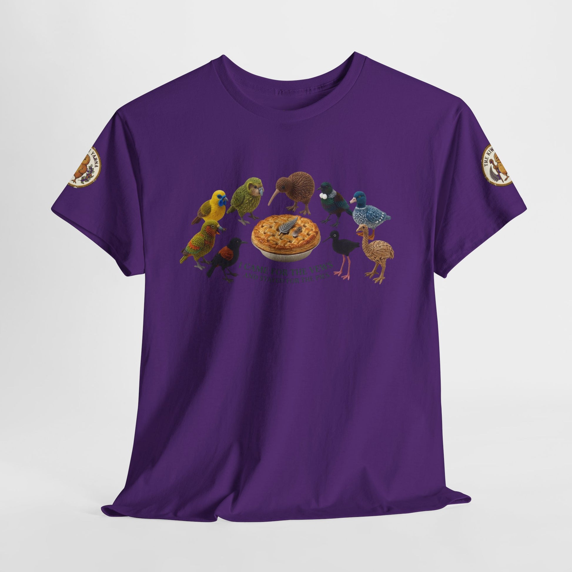 Purple graphic T-shirt with birds and pie-style emblem on front