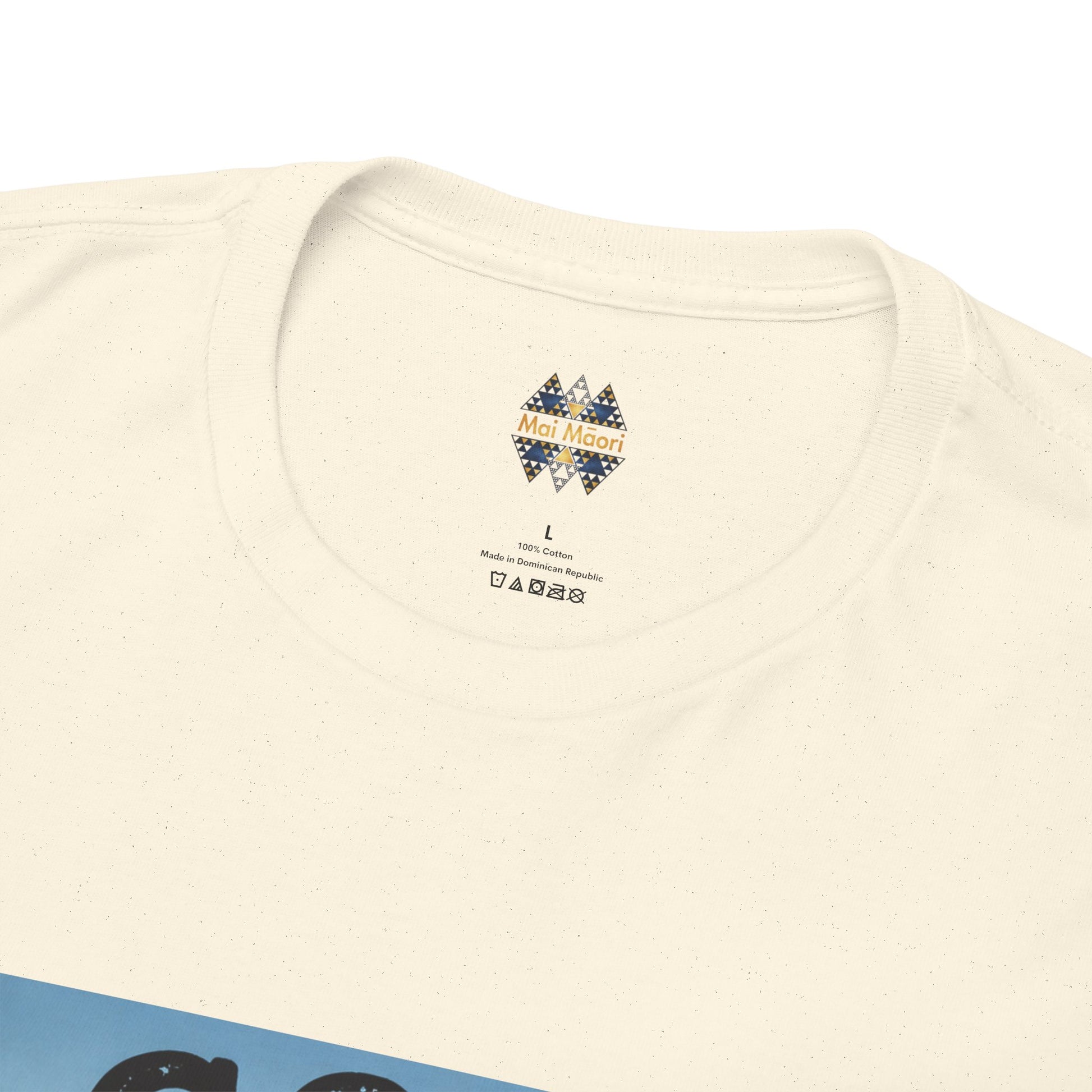 Cream crew-neck T-shirt with small chest logo and geometric emblem near collar