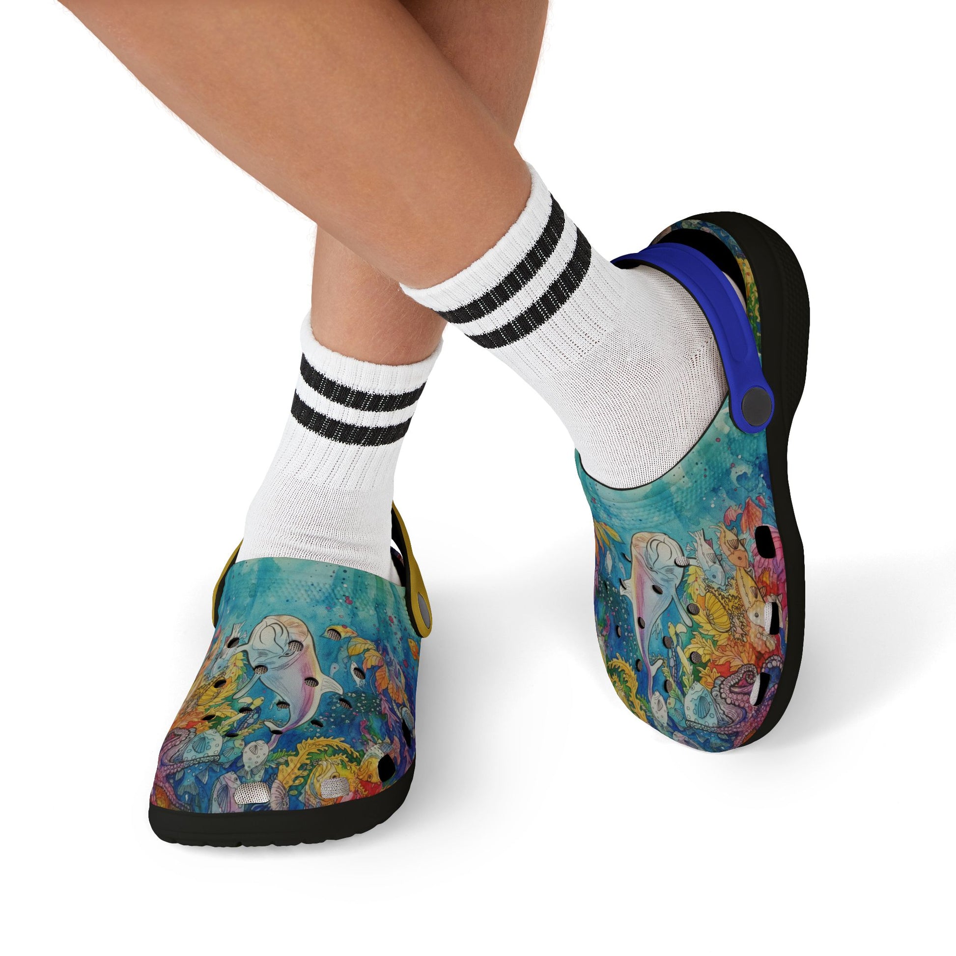 Kids ocean-print clog shoes with white socks and black sole; blue strap shows on side