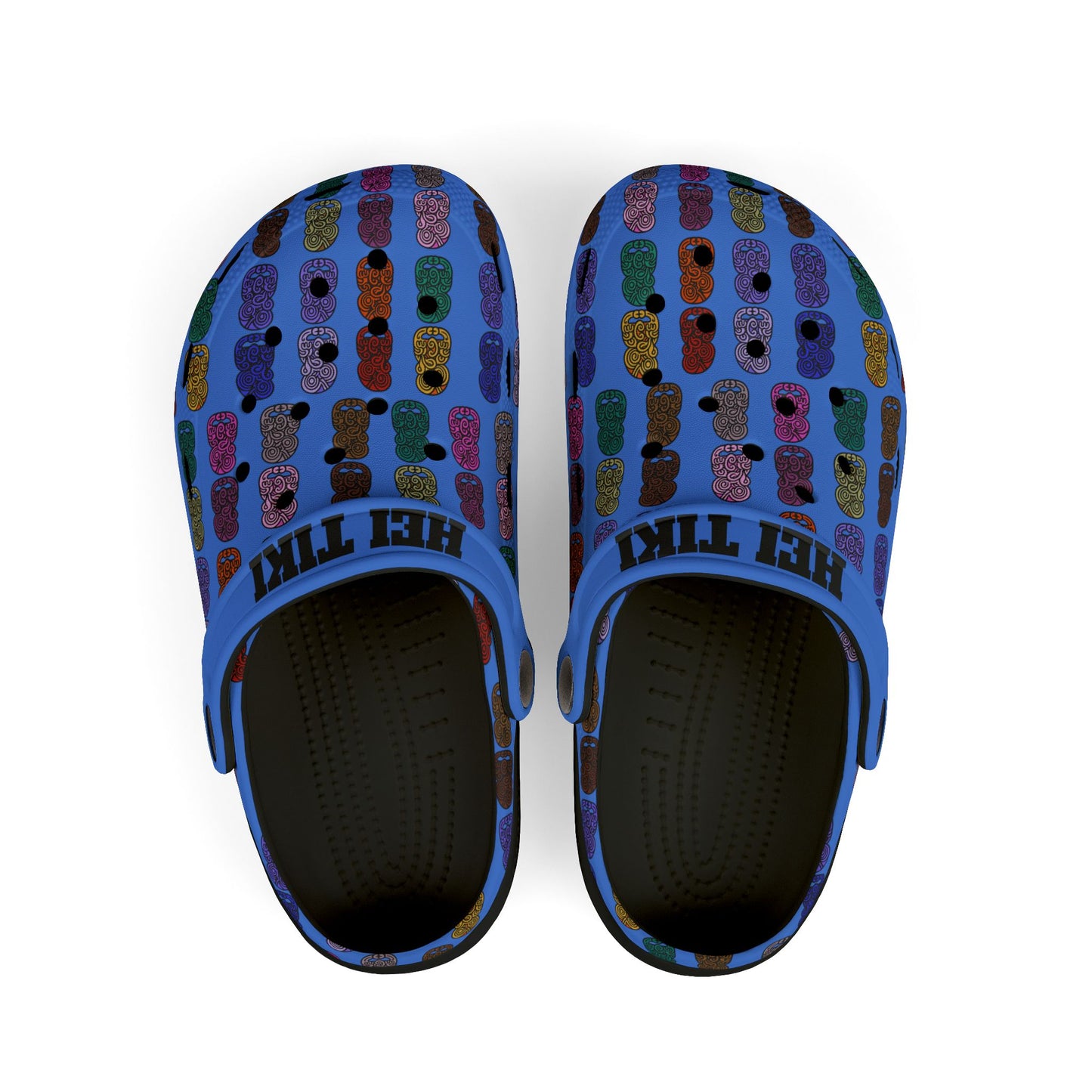 Kids slip-on casual shoe with blue patterned upper, multicolor tiki print, dark interior