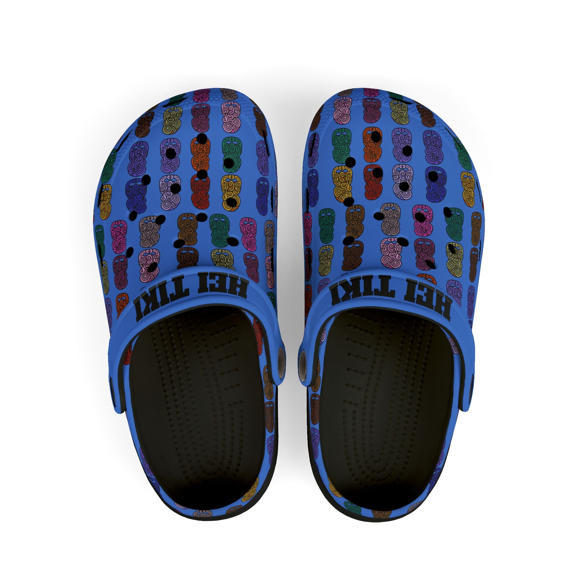 Kids slip-on casual shoe with blue patterned upper, multicolor tiki print, dark interior