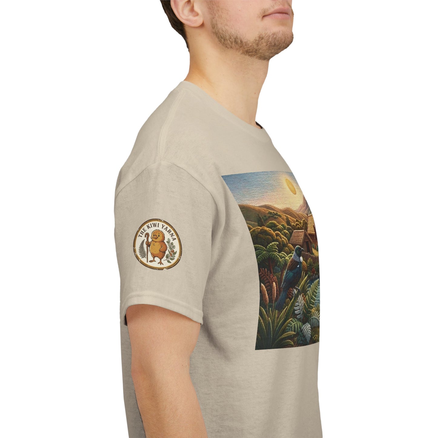 Cream graphic t-shirt side view with circular sleeve patch and landscape print on chest