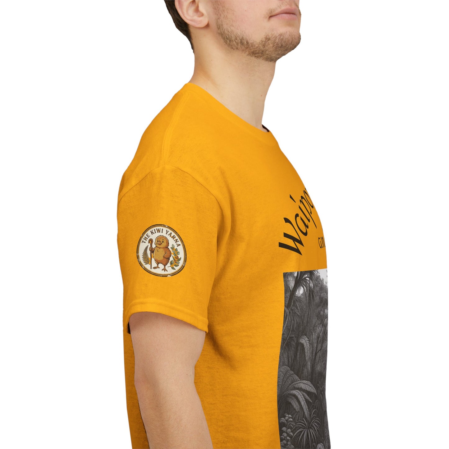 Mustard yellow T-shirt side view, sleeve logo patch and forest graphic print