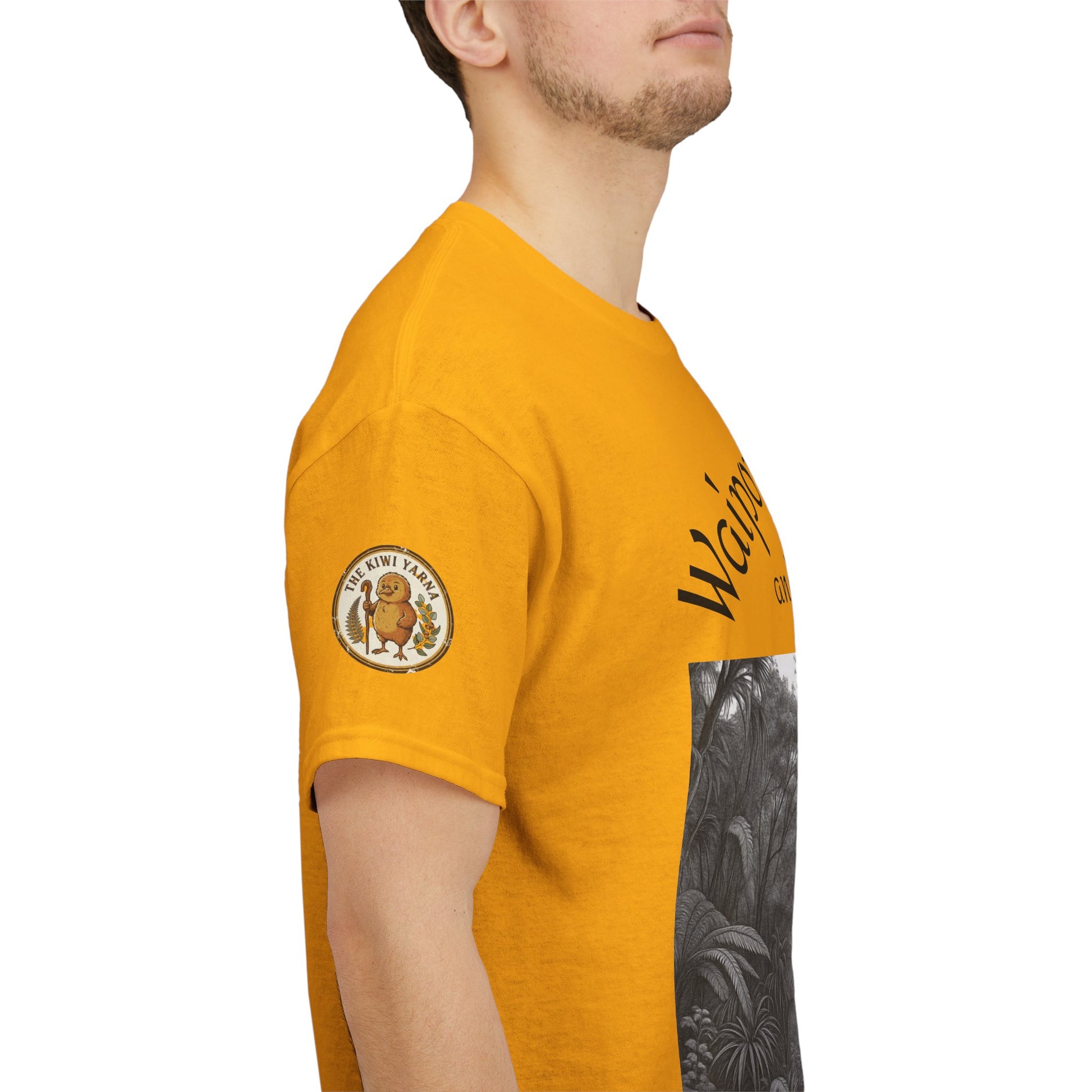 Mustard yellow T-shirt side view, sleeve logo patch and forest graphic print