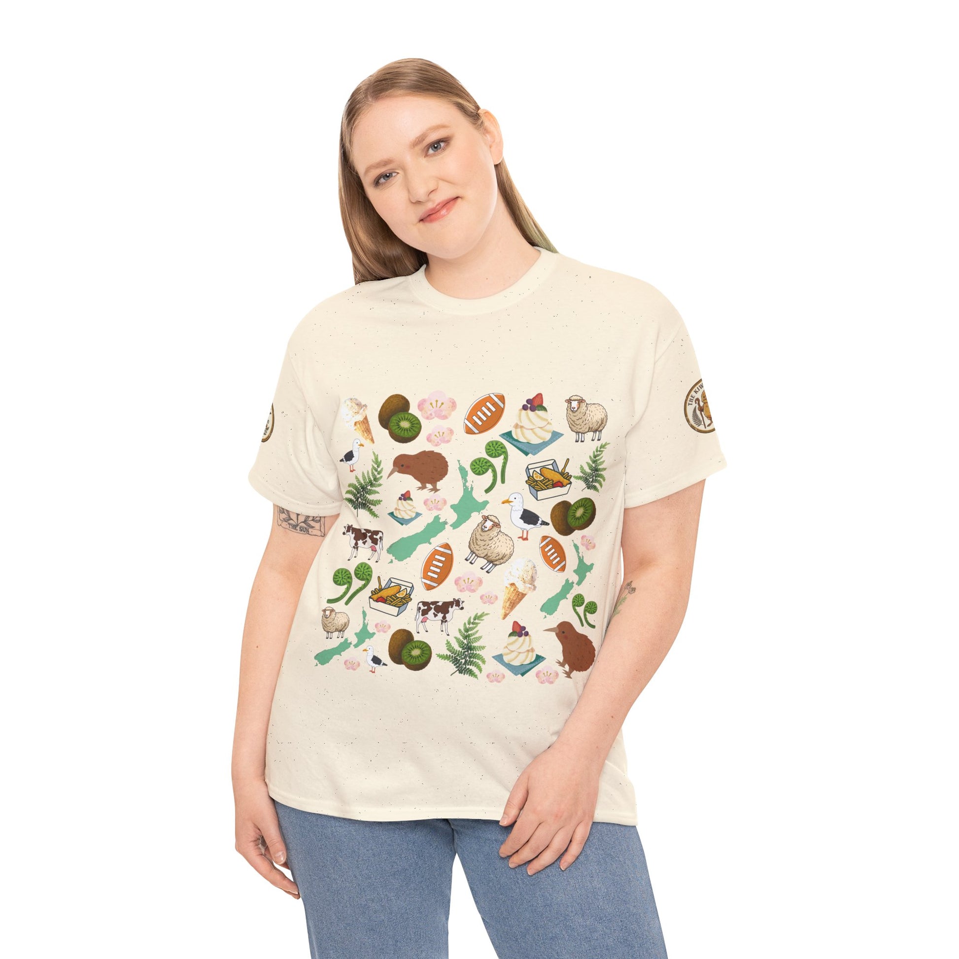 Cream graphic T-shirt worn by a model; colorful icons pattern across the front