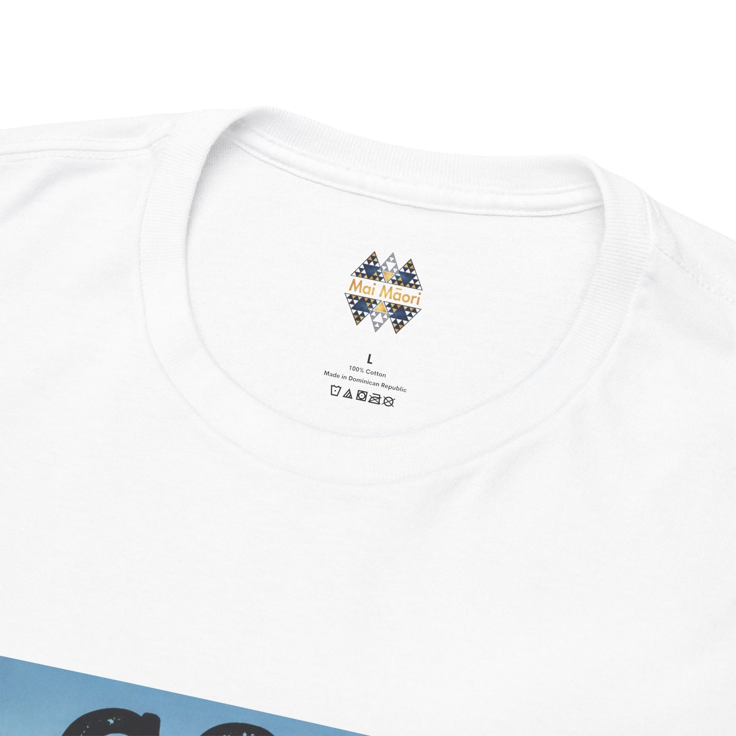 White T-shirt back close-up with “Mai Moai” label and care icons