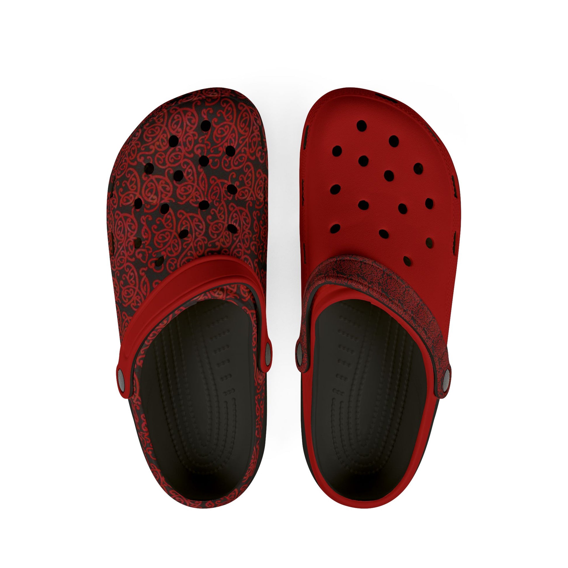 Red slip-on clog shoes with black dots and ornate upper, ventilation holes