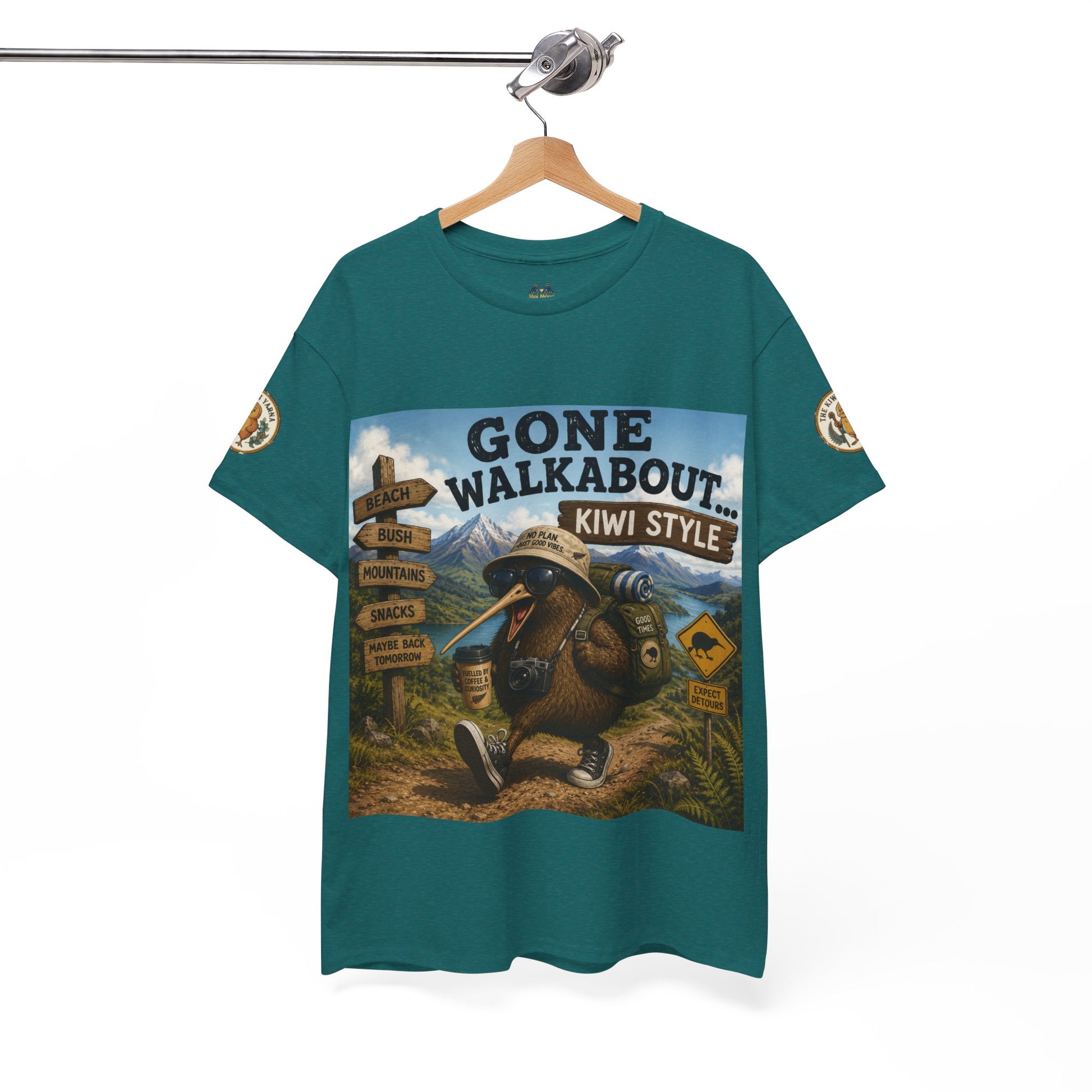 Teal crew-neck T-shirt with large adventure kiwi graphic and sleeve patches