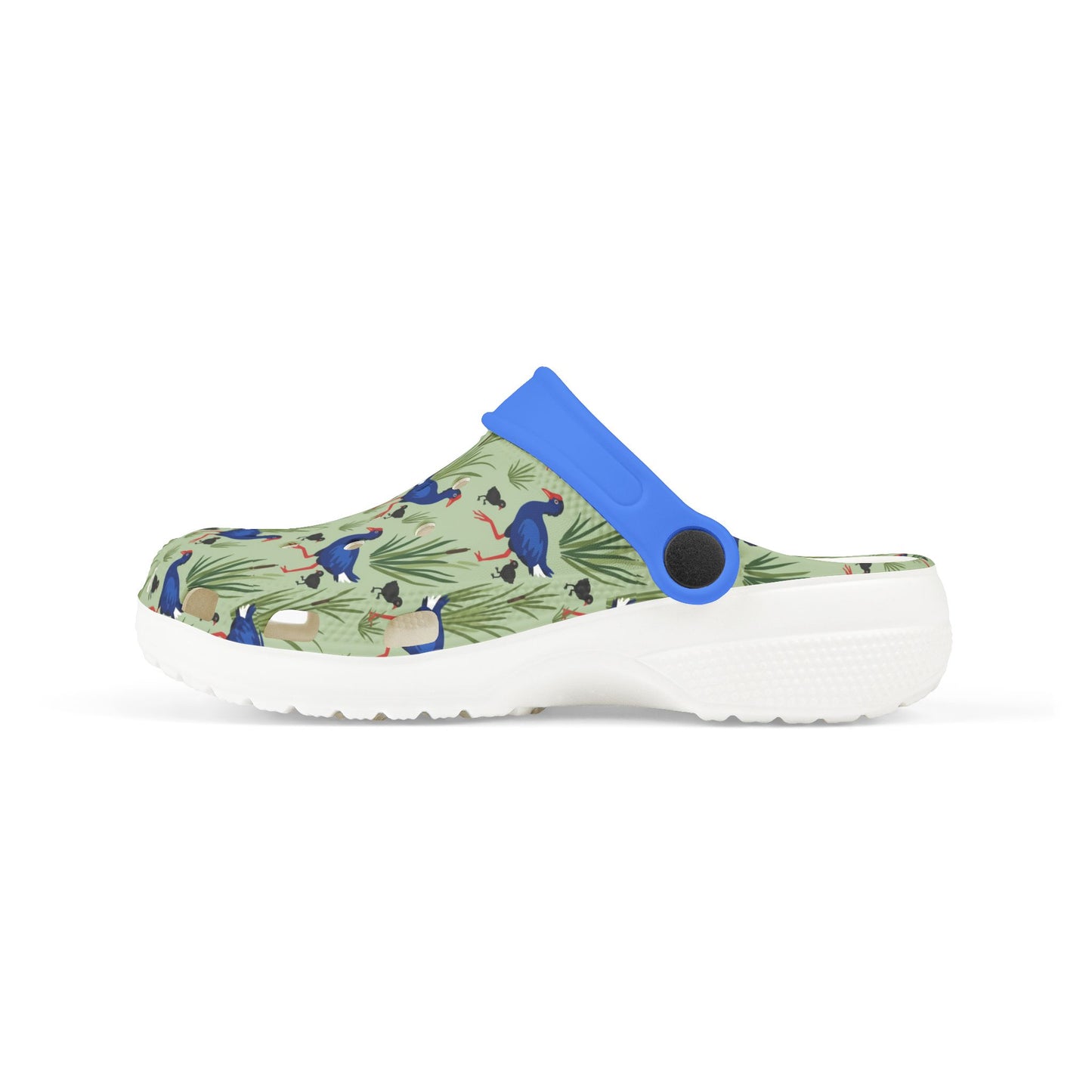 Kids clog shoes with green animal print upper and blue heel strap, white sole.
