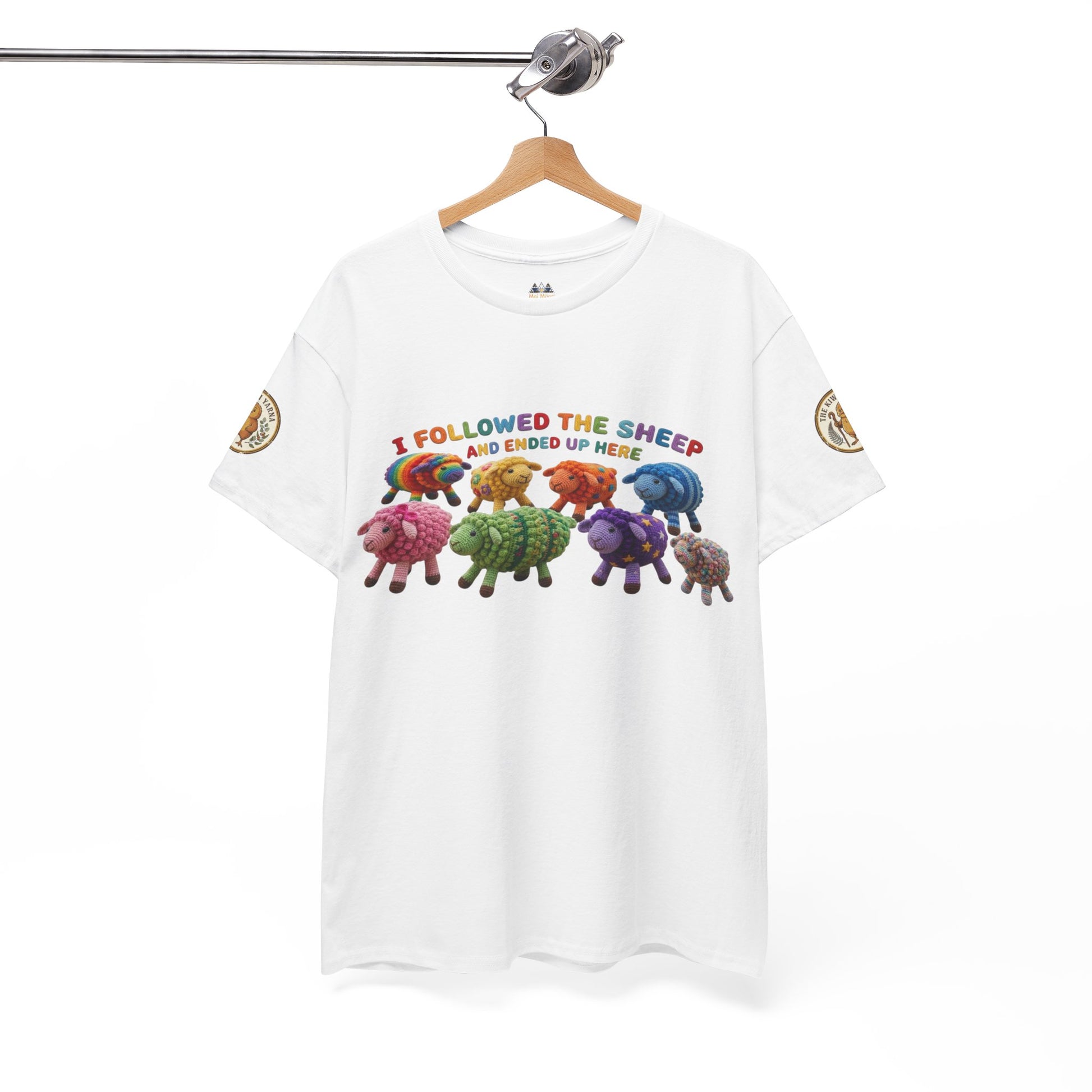 White hanging T-shirt with colorful sheep herd graphic and sleeve patches