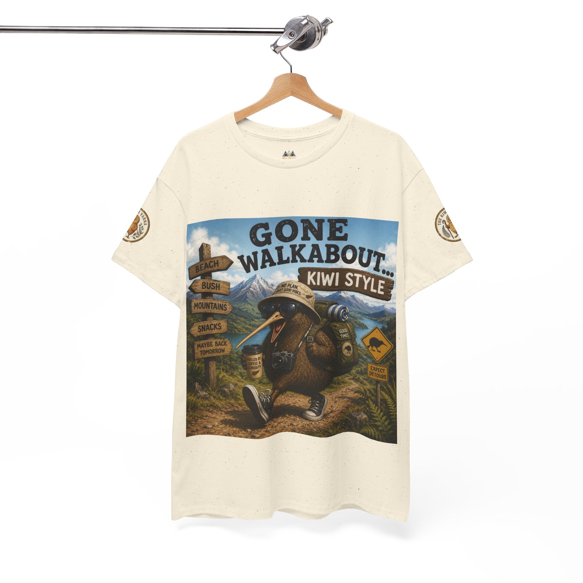 Cream graphic T-shirt on hanger with "Gone Walkabout Kiwi Style" front print