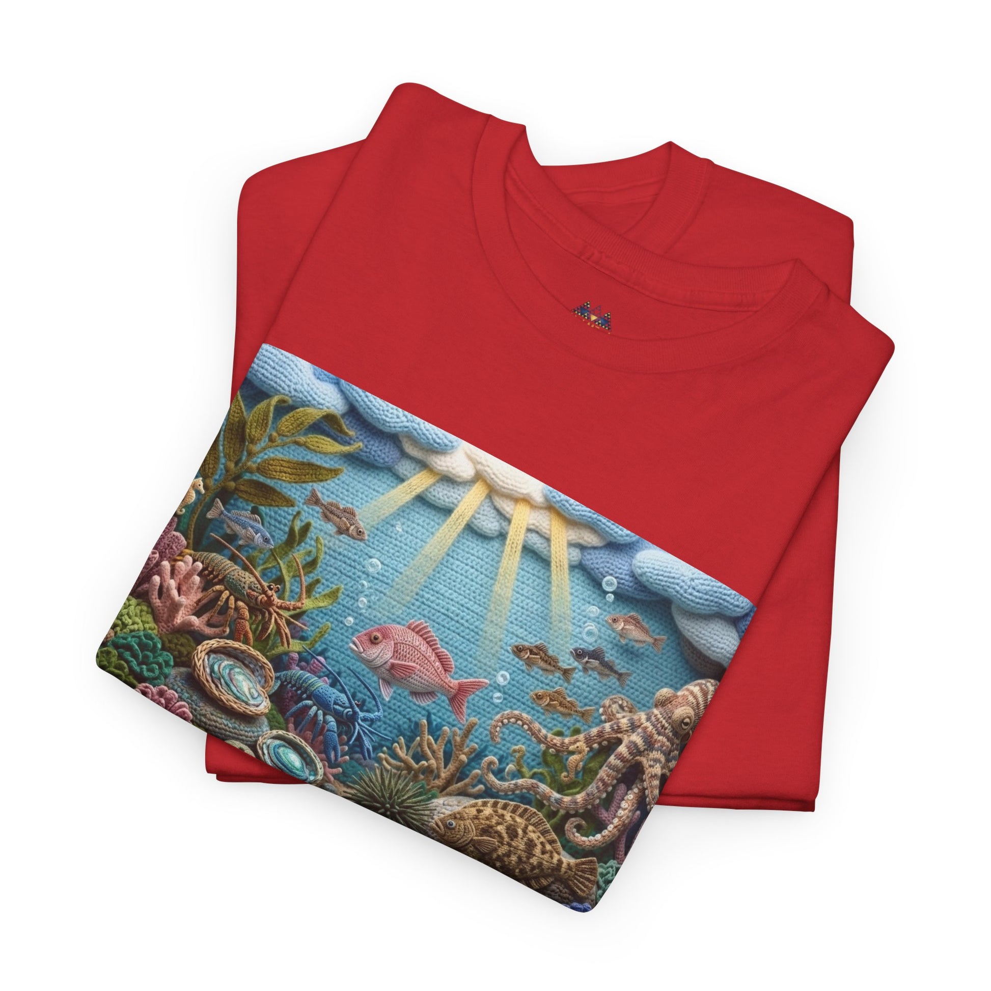 Red T-shirt with rectangular underwater sea-life print panel across the chest.