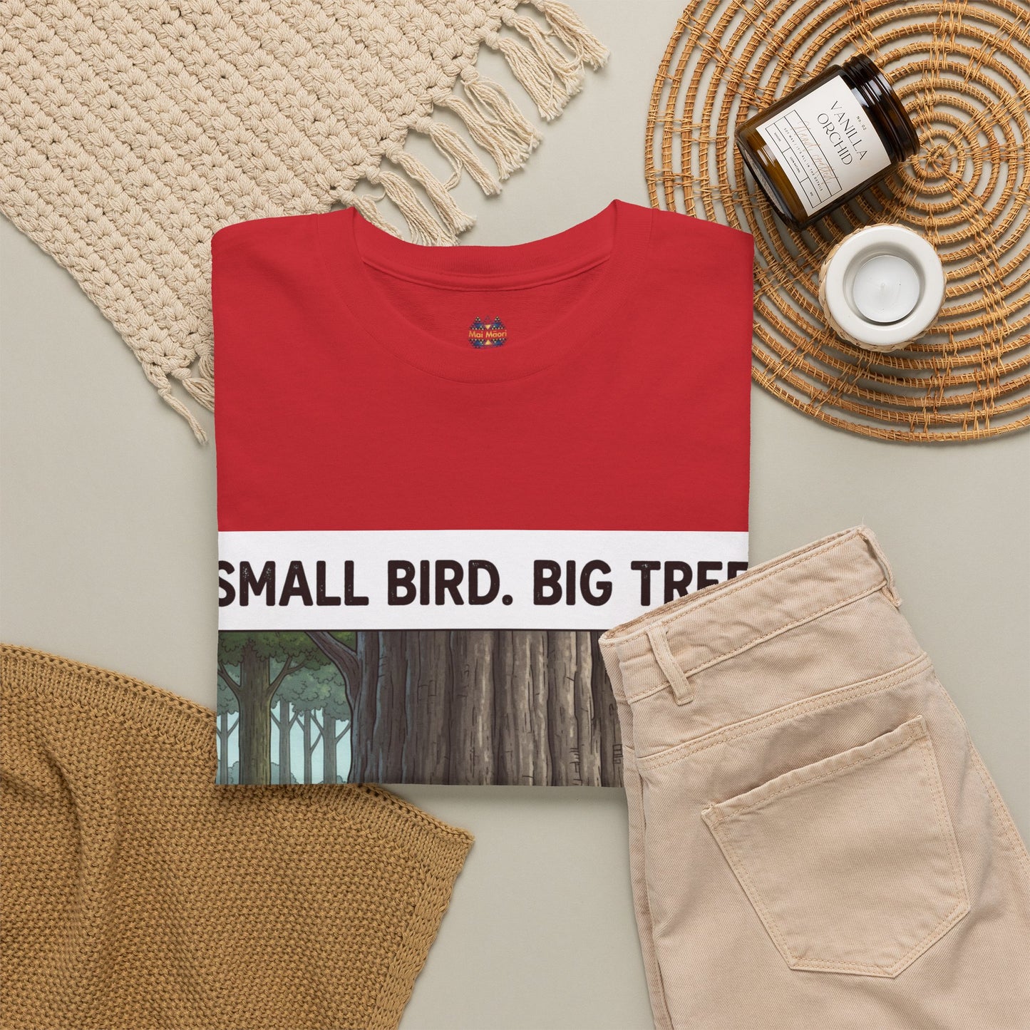 Red graphic t-shirt top view with tree scene front print